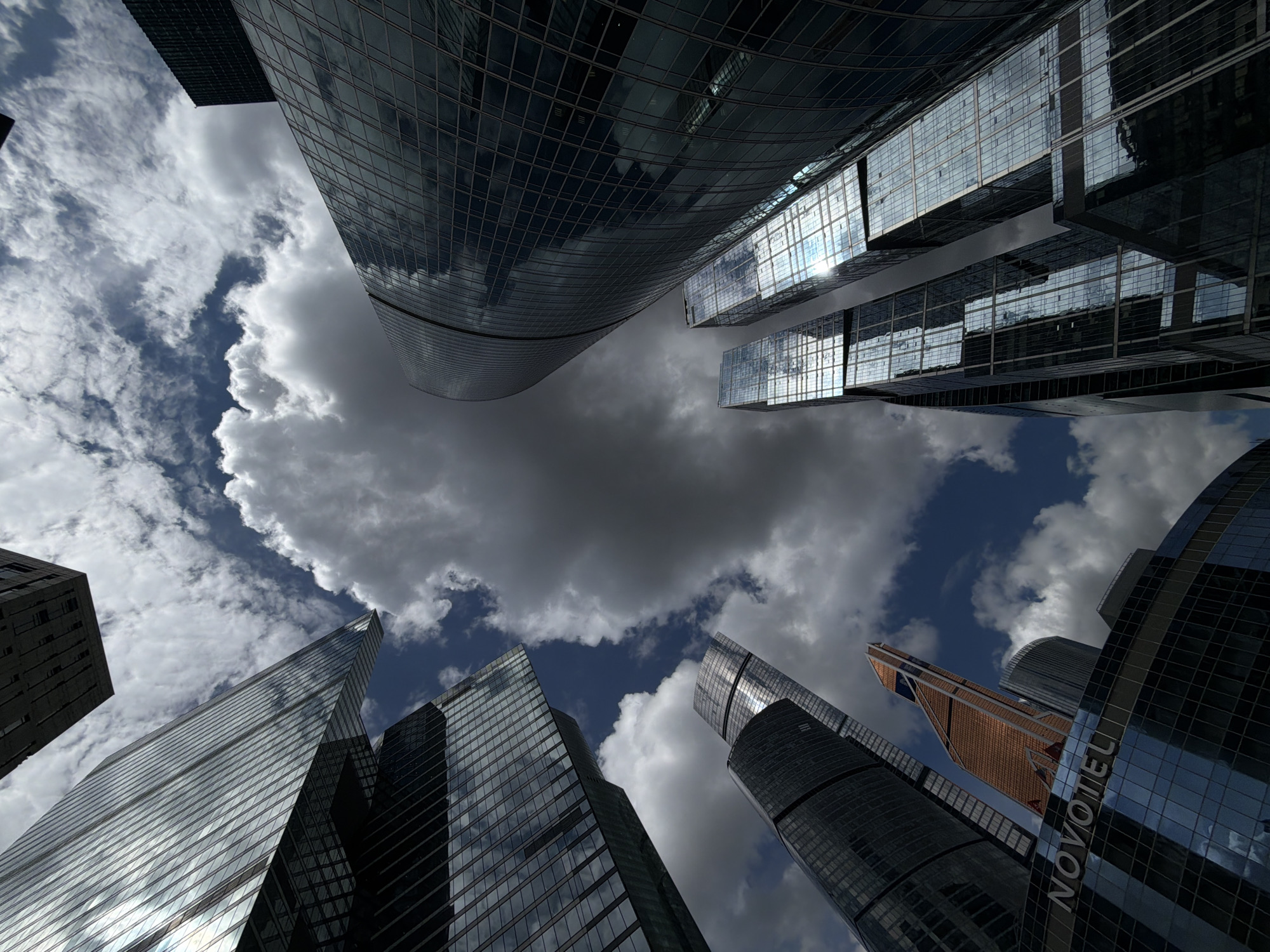 Glass skyscrapers photographed from below in Khimki, Russia
