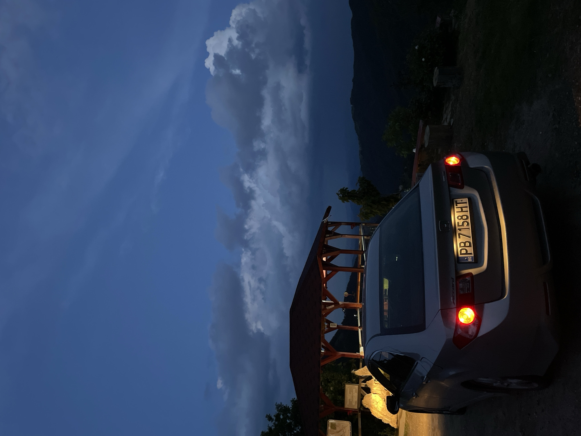 Evening life captured at Bulgarian mountain gazebo overlook