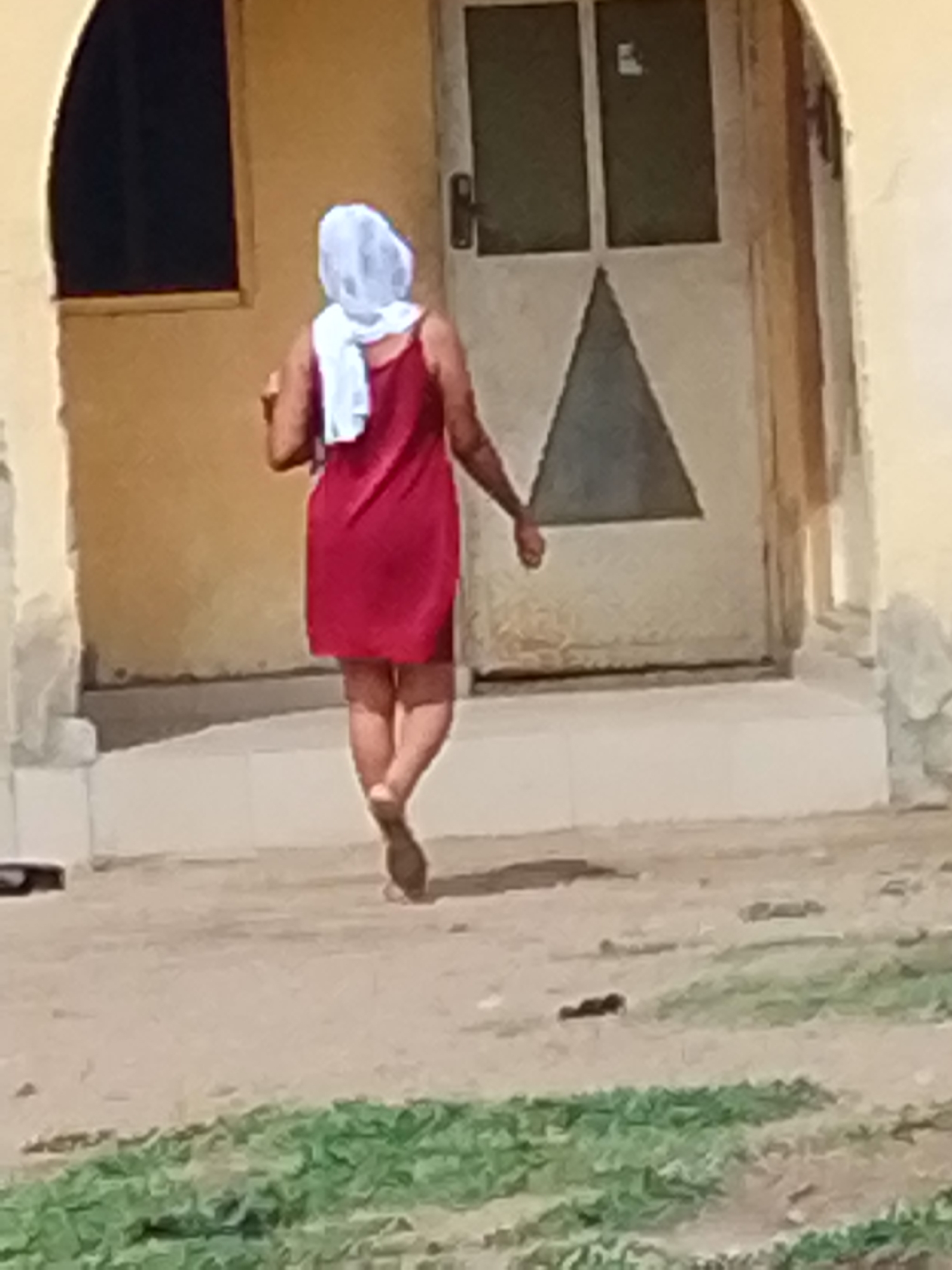 Daily life unfolds on Lokoja streets during afternoon hours