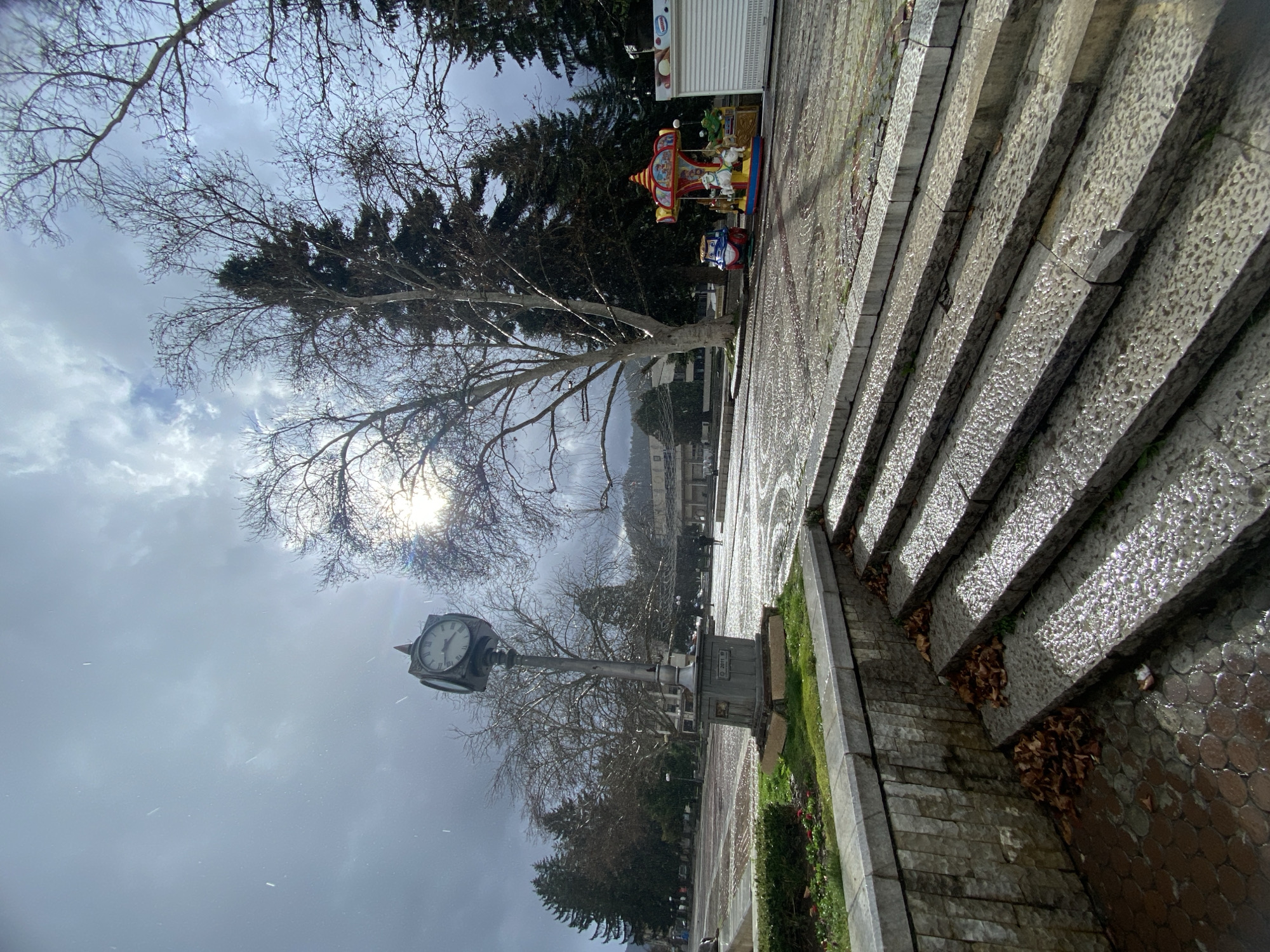 Light snow falls on public square in Troyan, Bulgaria