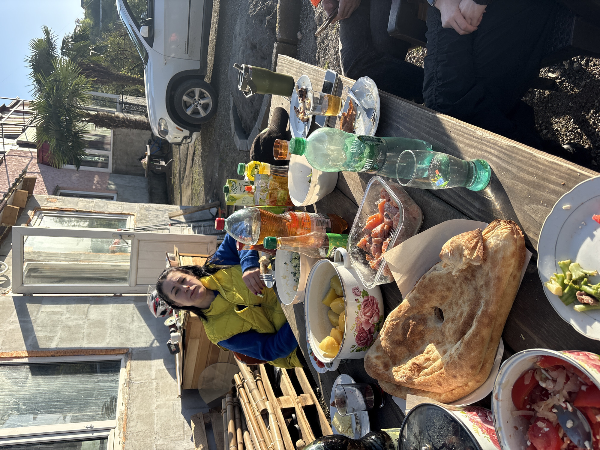 Outdoor feast documented at picnic table in Chakvi, Georgia
