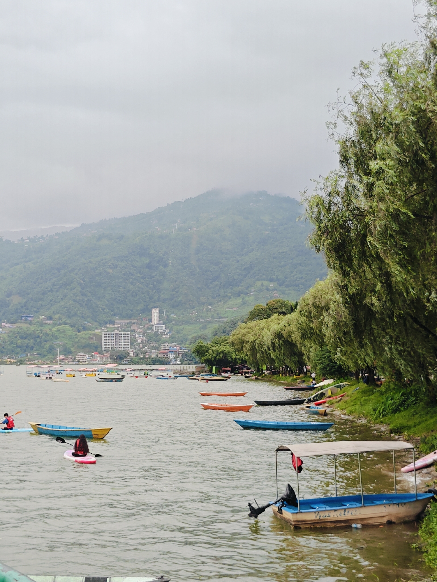 A cloudy morning along Phewa Lake's shores in Pokhara