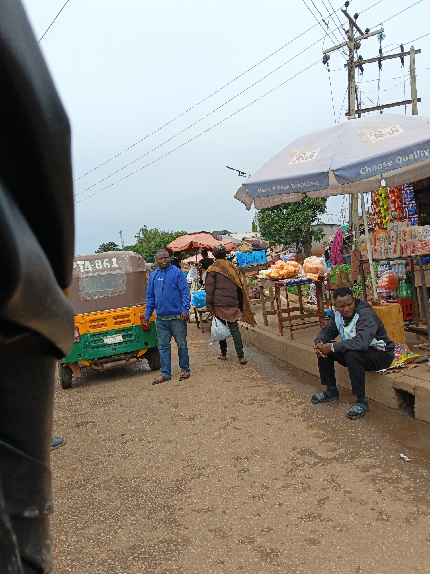 Morning street life and commerce in Bukuru, Nigeria