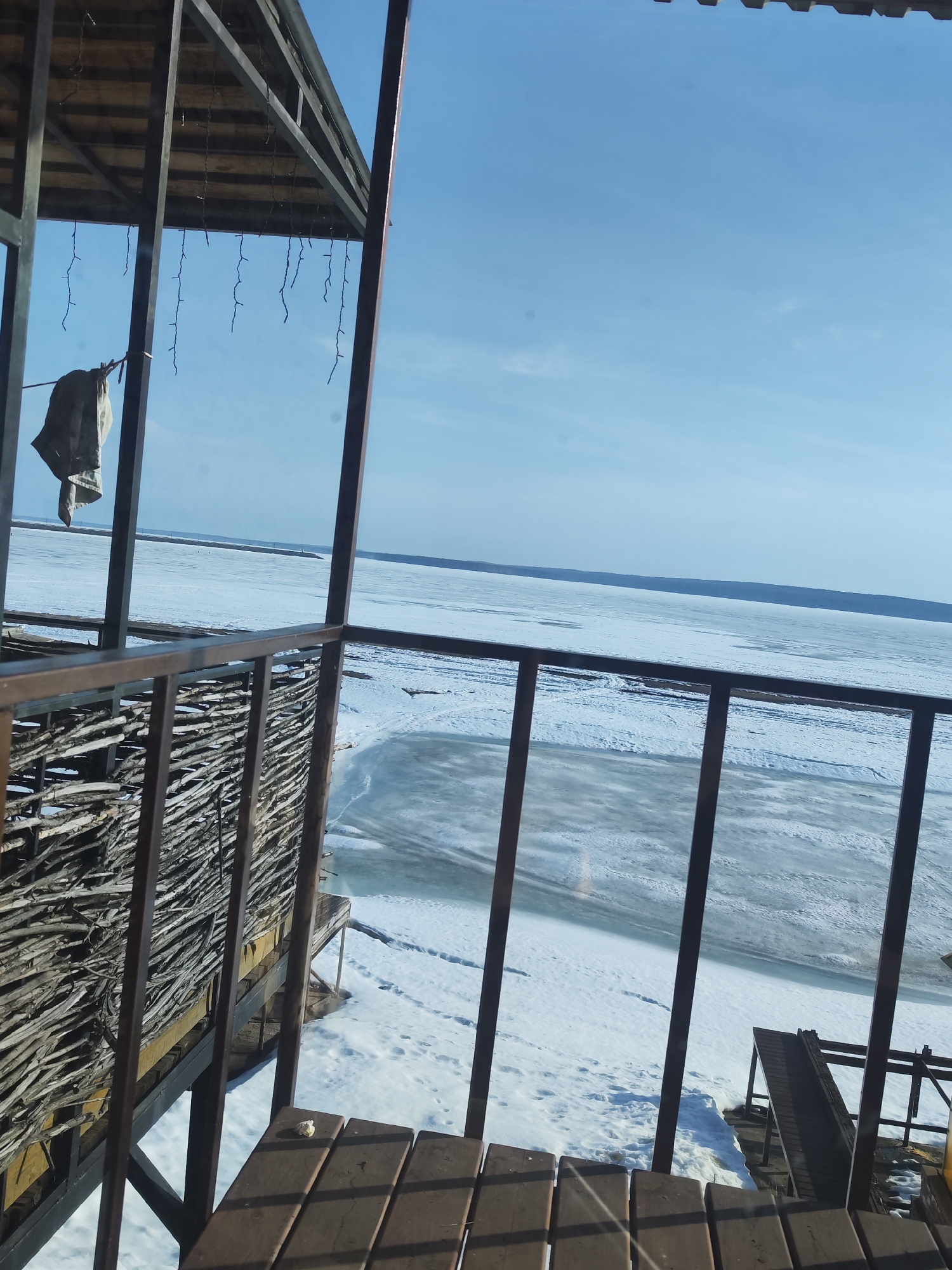 Winter scenes documented along frozen Kama River in Chaikovsky