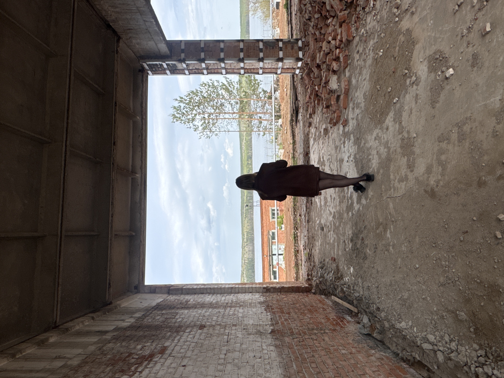 Woman Takes Selfies at Abandoned Building Site in Chaikovsky