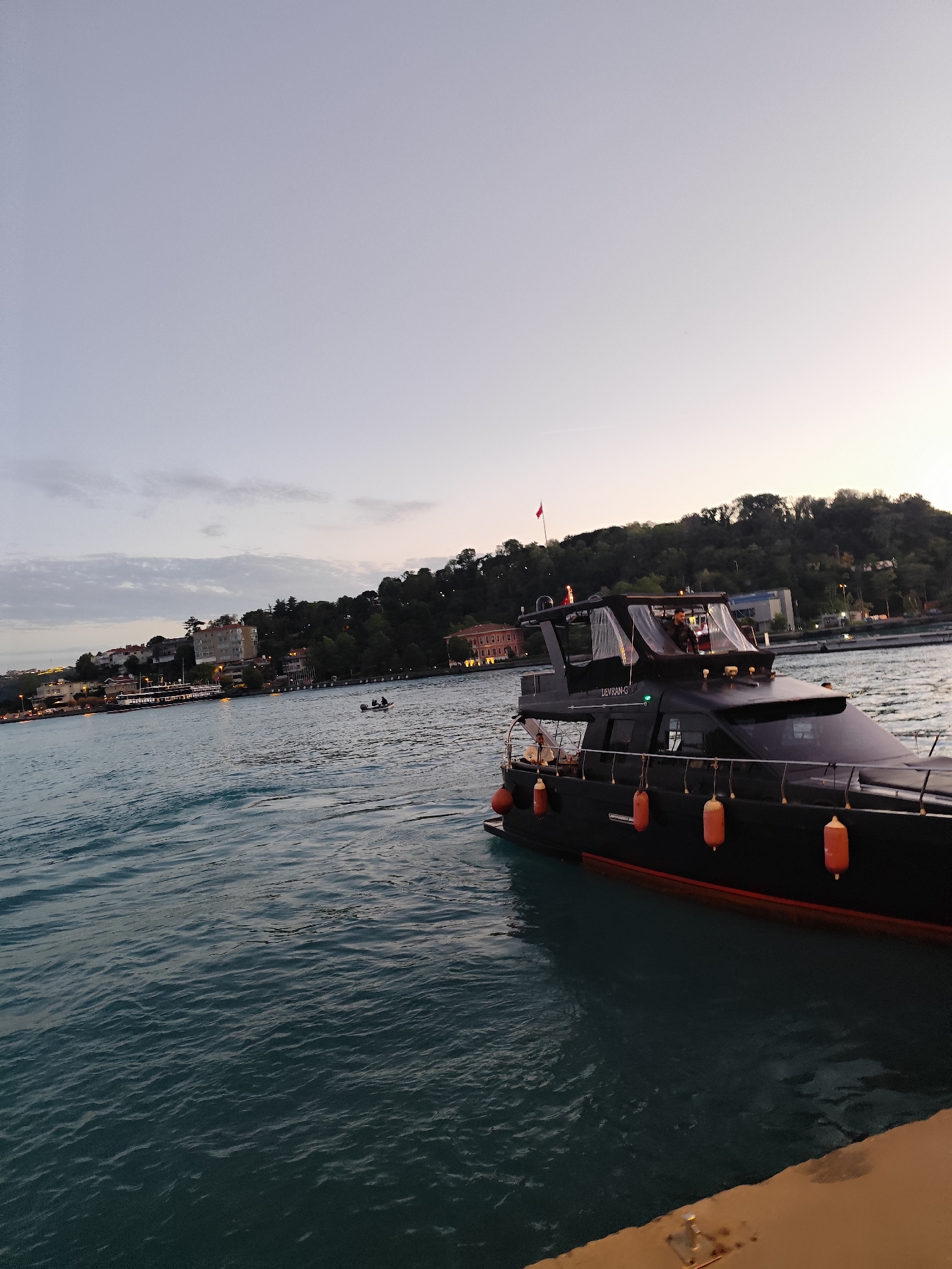 Evening marina life documented along Bosphorus waterfront in Sarıyer