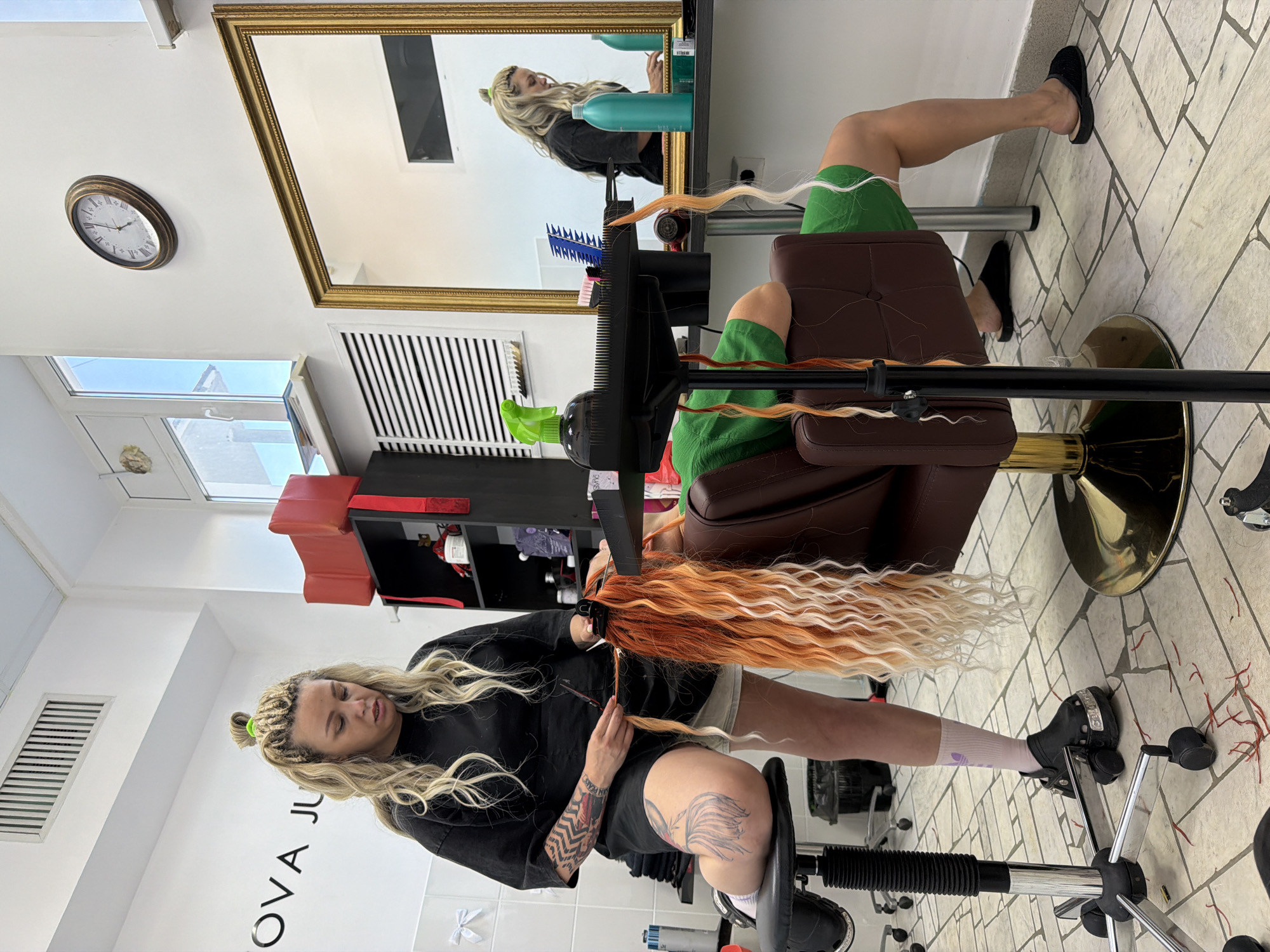 Braided extensions and a bold color change at a Chaikovsky salon
