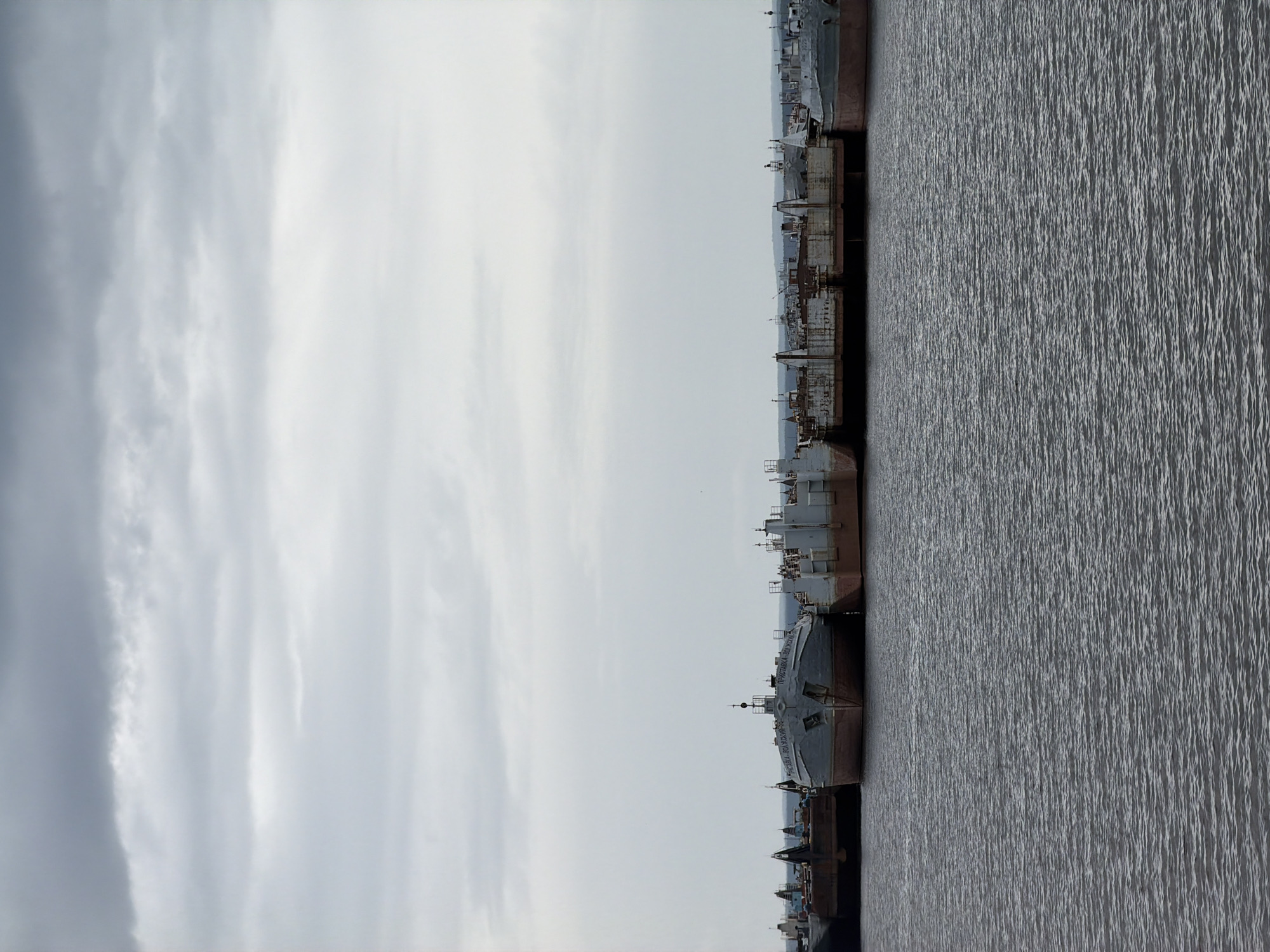 Morning scenes documented around Chaikovsky's waterways and industrial areas