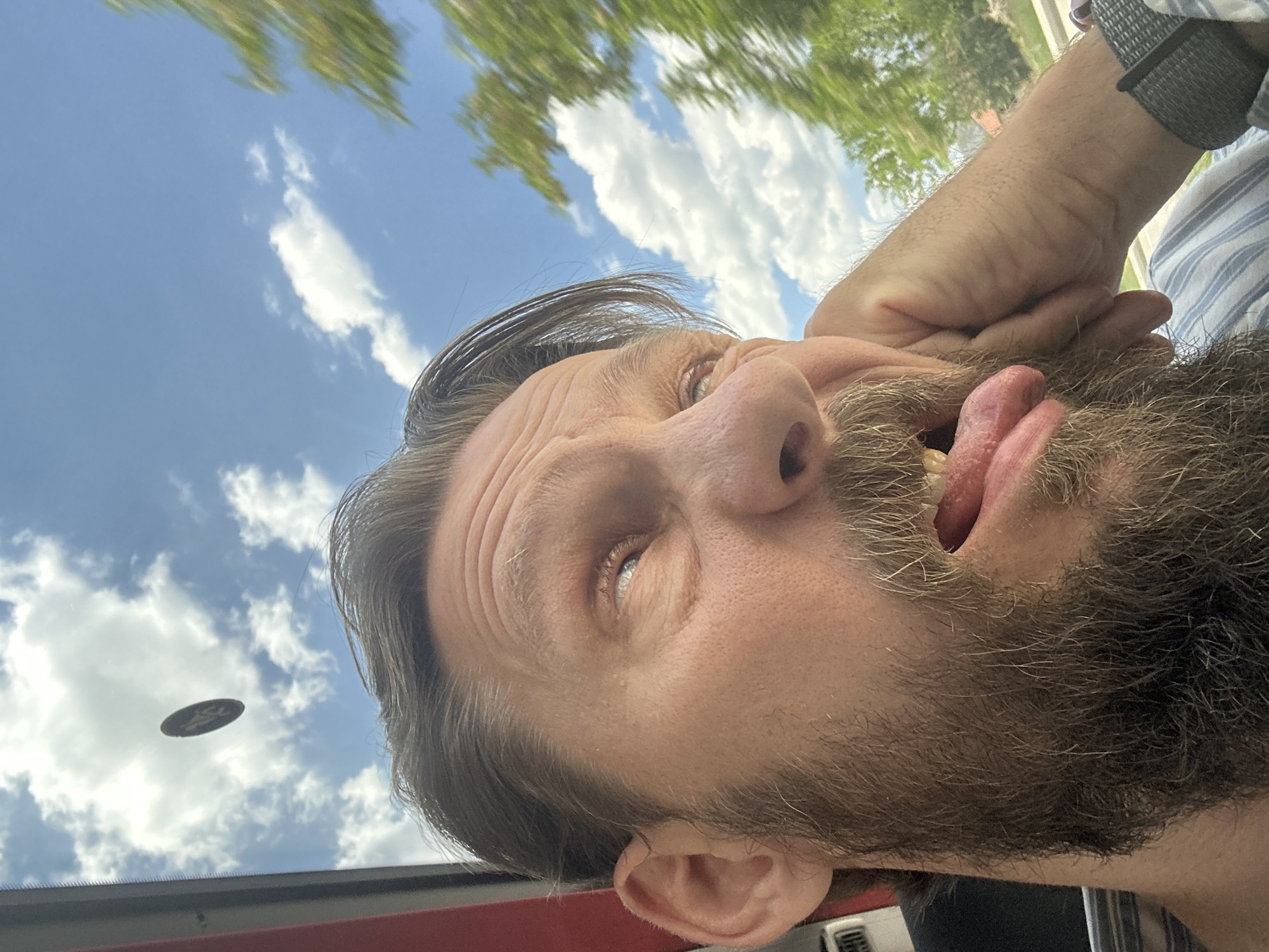 Man takes upward-angle selfie in Çavdır, Turkey