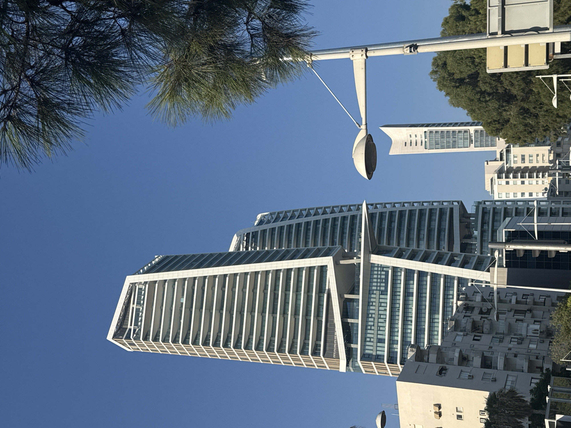 Limassol waterfront: beaches, cargo ships, and city skyline