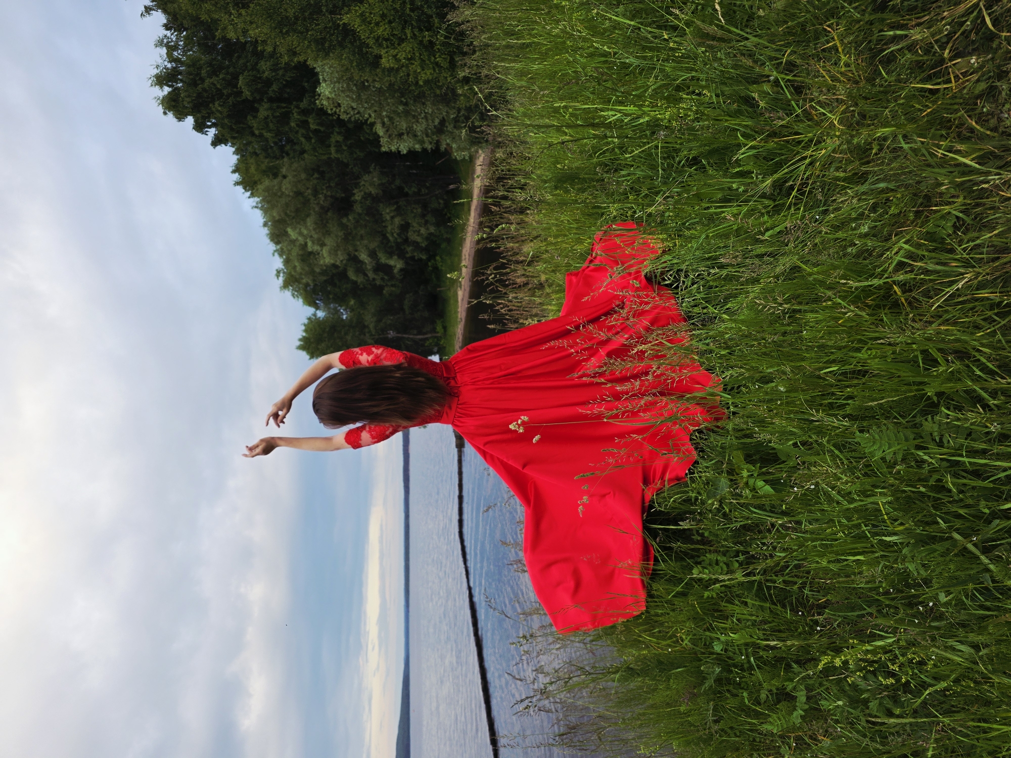 Woman with peonies explores Chaikovsky, Russia during afternoon outing