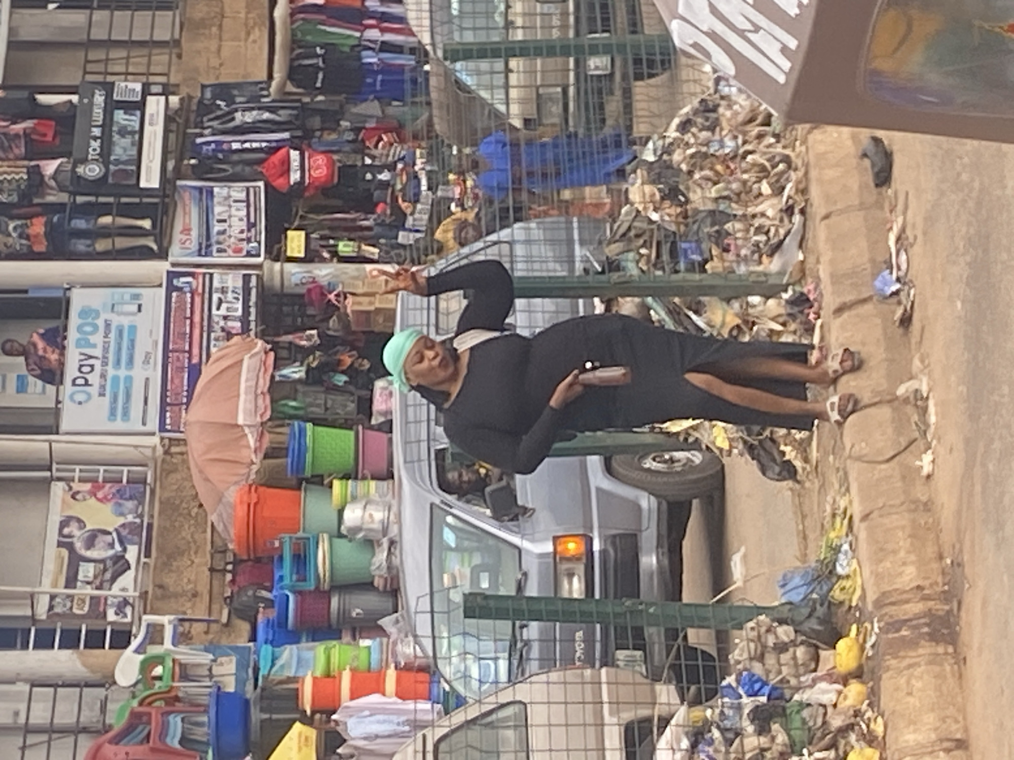 Afternoon street life and market activity in Bukuru, Nigeria