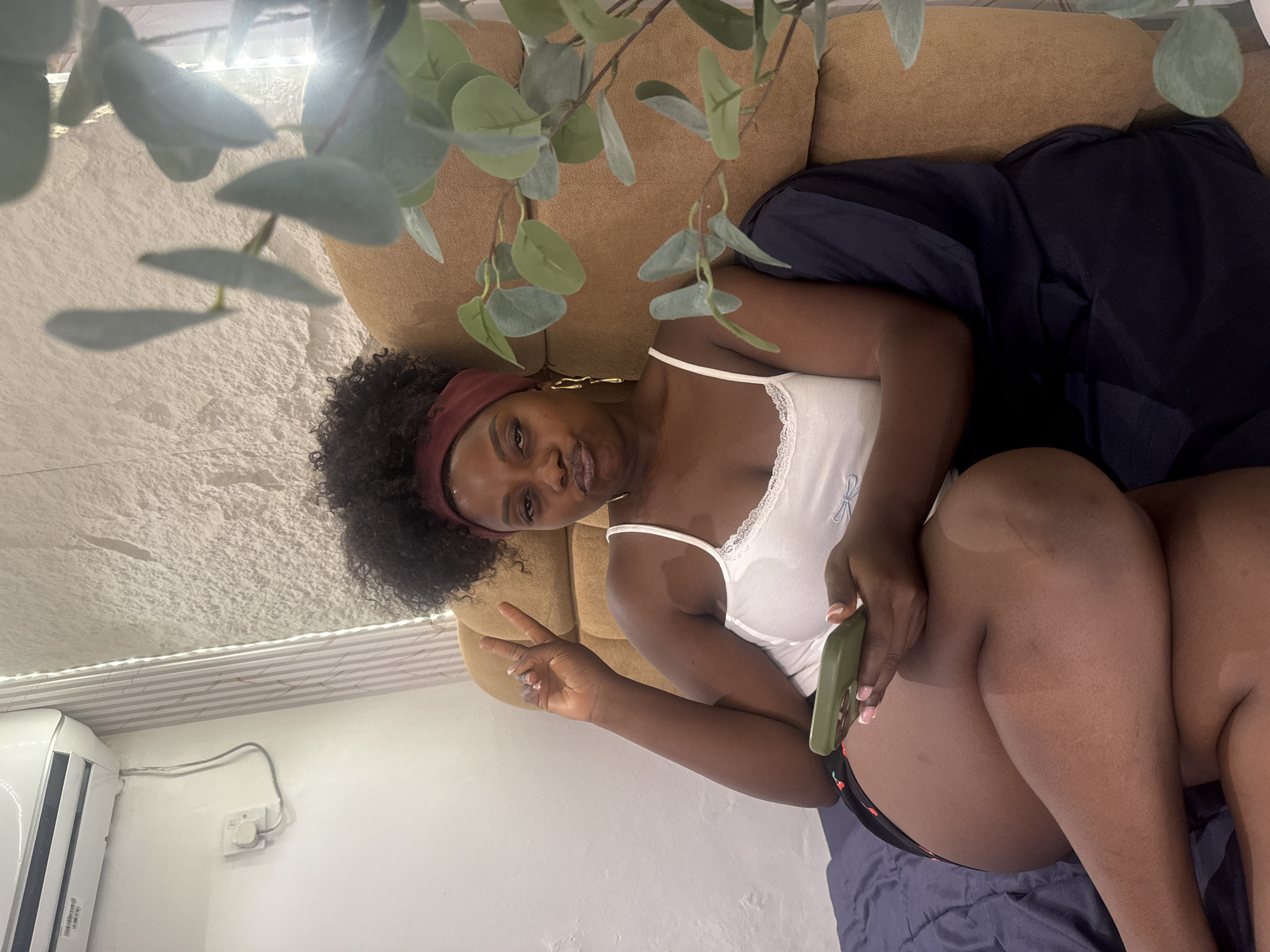 Cozy afternoon at home in Abuja with a fluffy dog