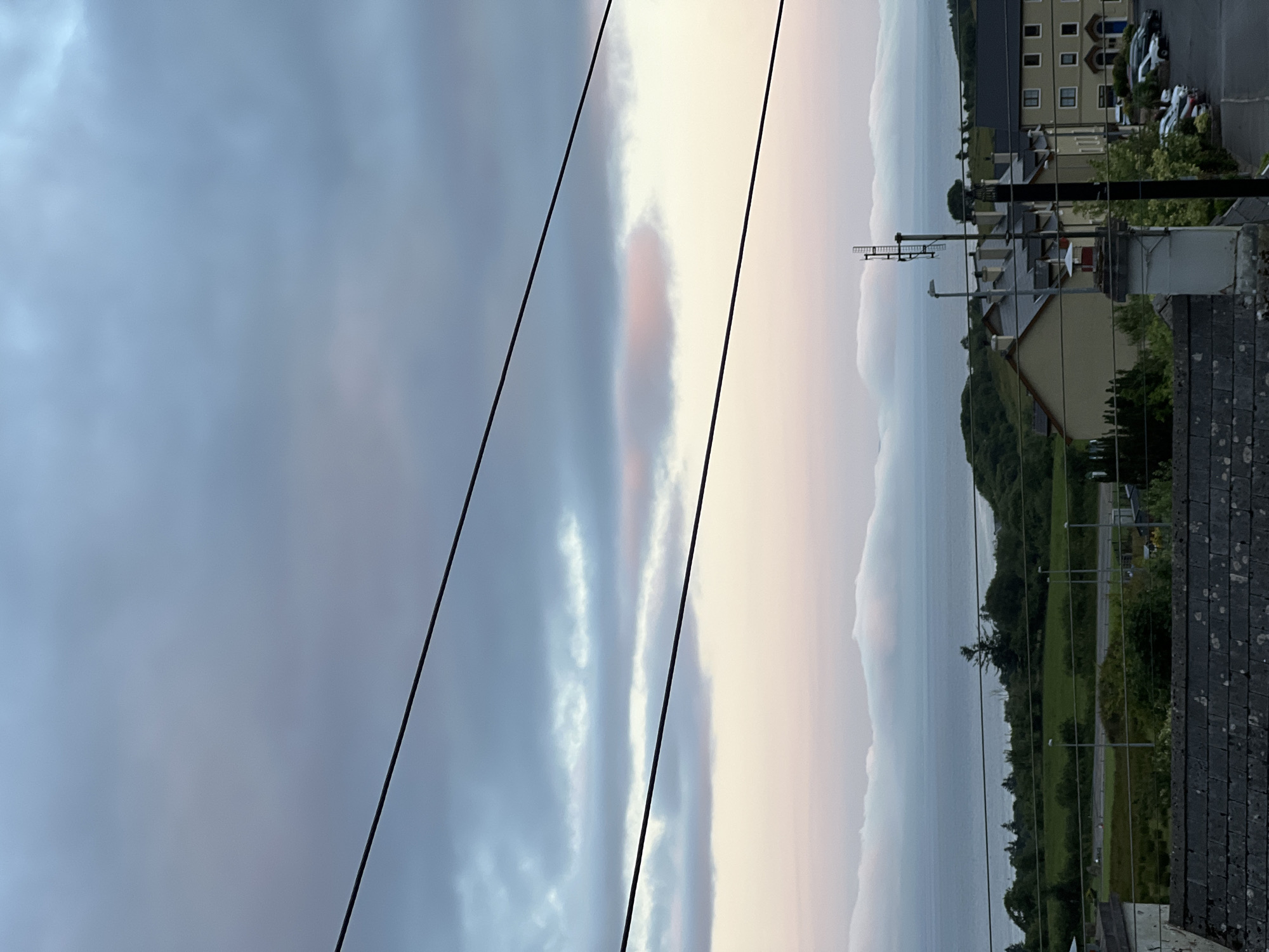 Dusk settles over Mountcharles village and its coastal hillside