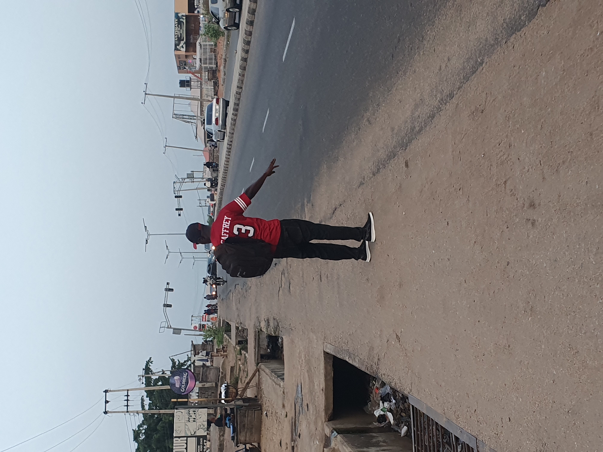 Daily street life documented across Lokoja, Nigeria during evening hours