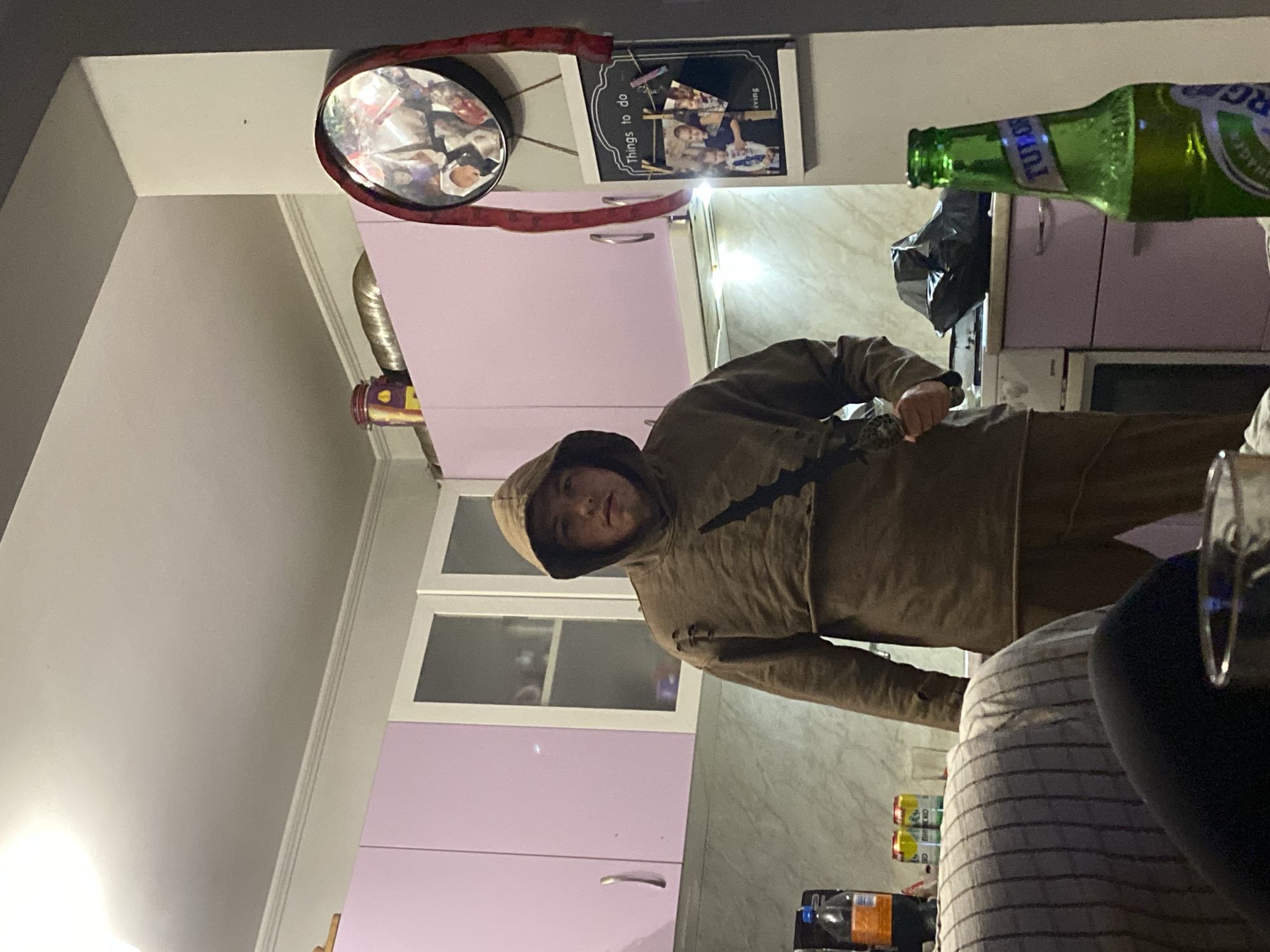 Hooded figure spotted in Bulgarian kitchen, VW bus art observed