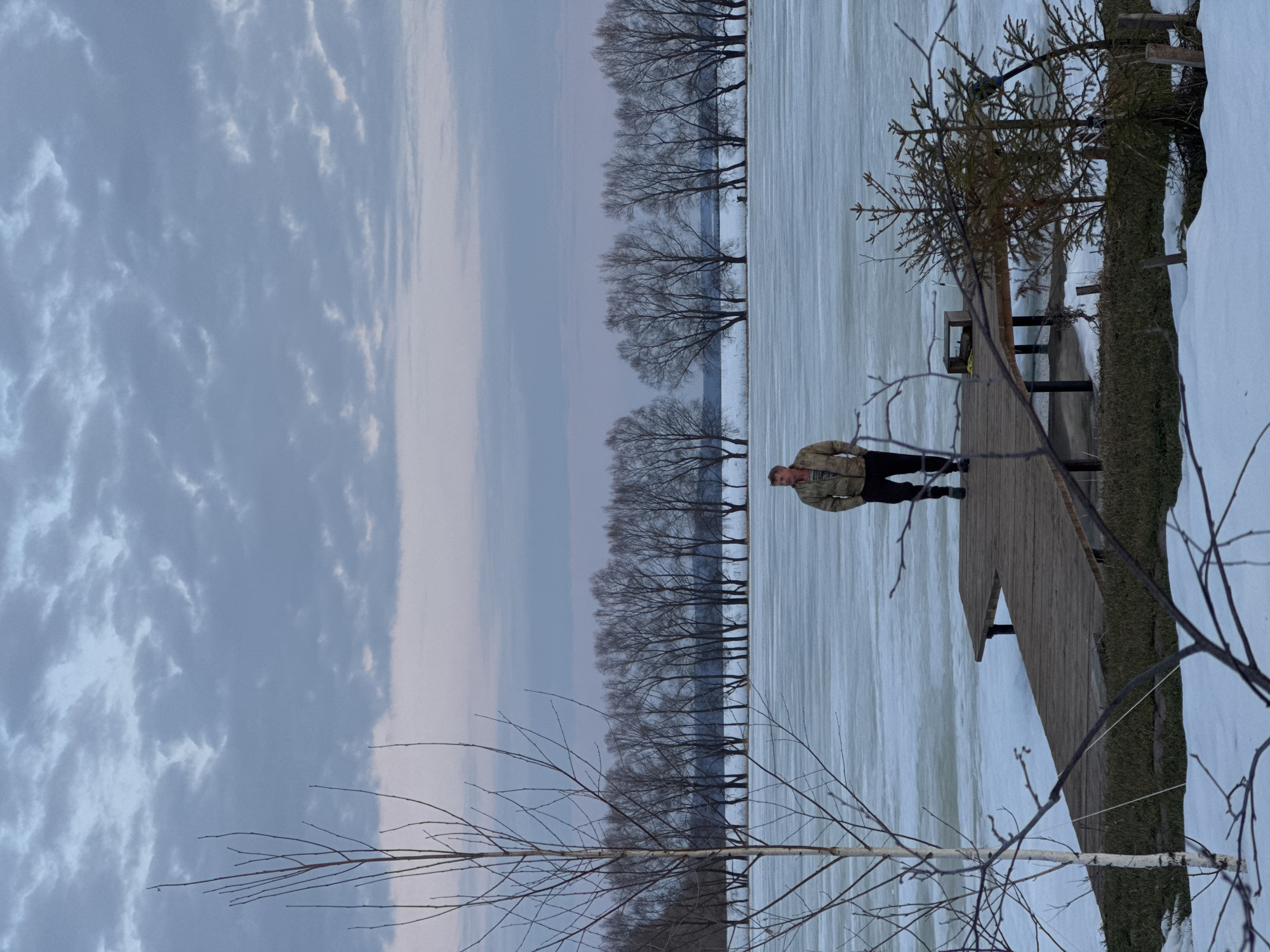 Late winter scenes captured at frozen lakeside location