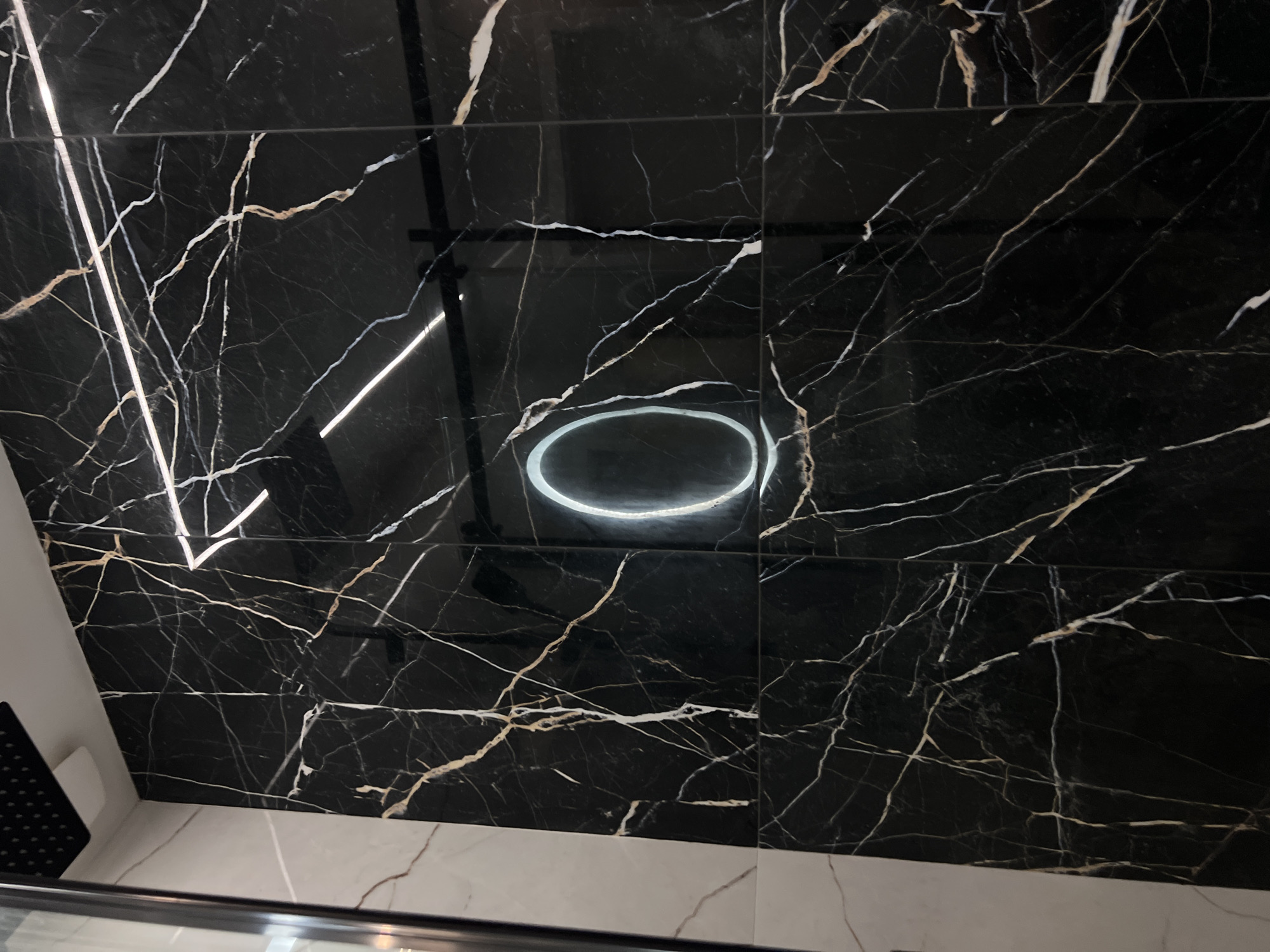 Black marble bathroom interior documented in Bansko, Bulgaria
