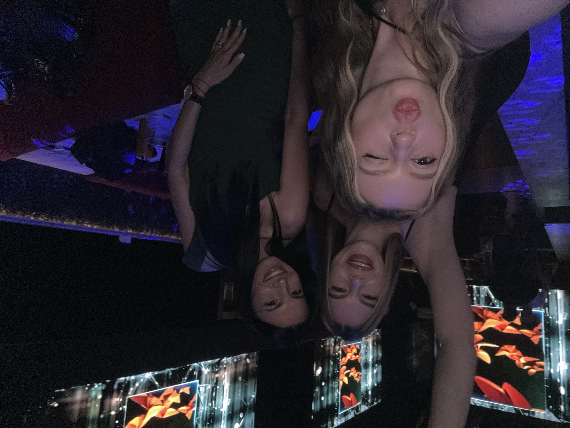 Night out at a Plovdiv club with glowing screens and selfies