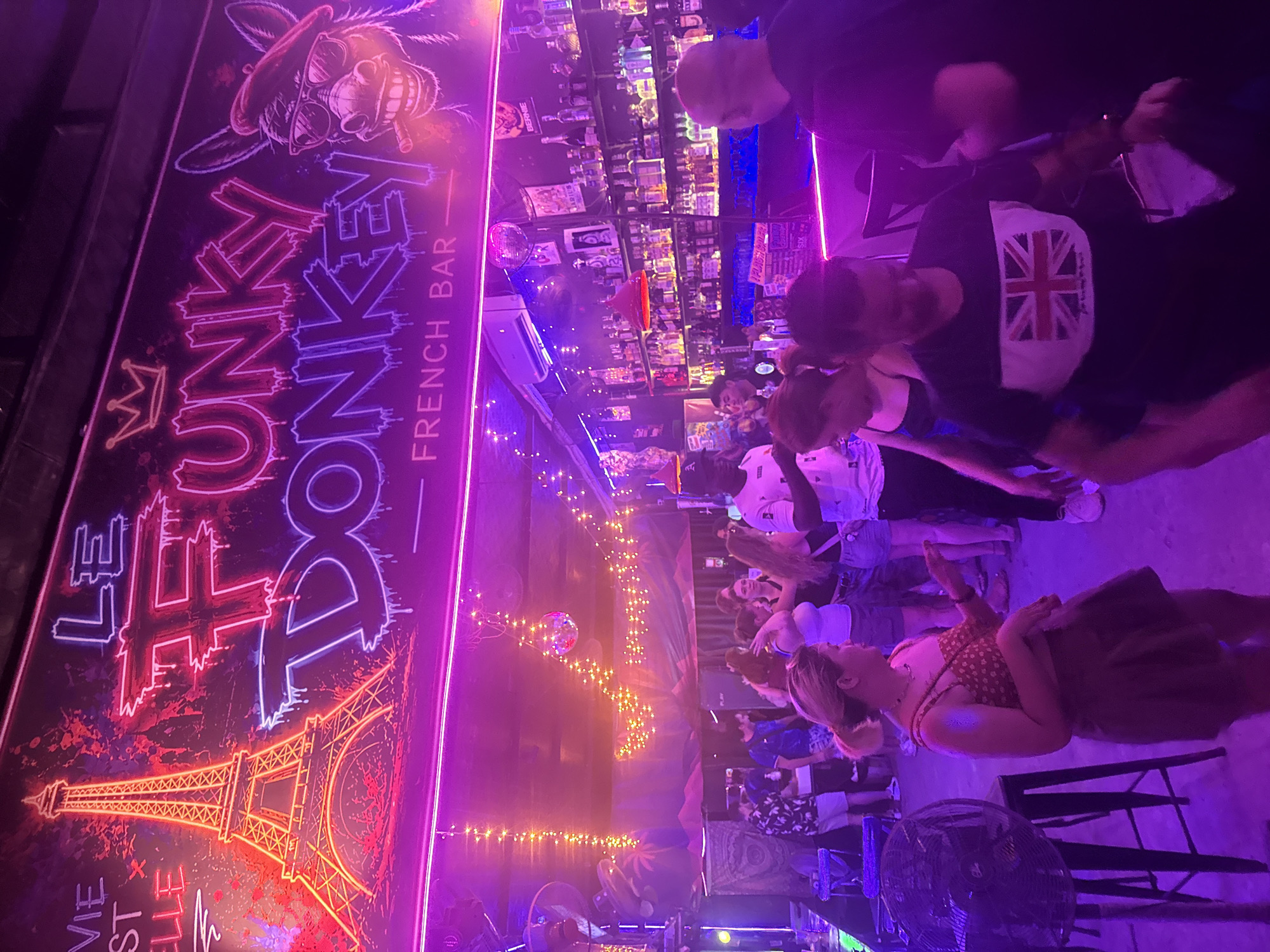Drag performer entertains crowd at Le Donkey French Bar