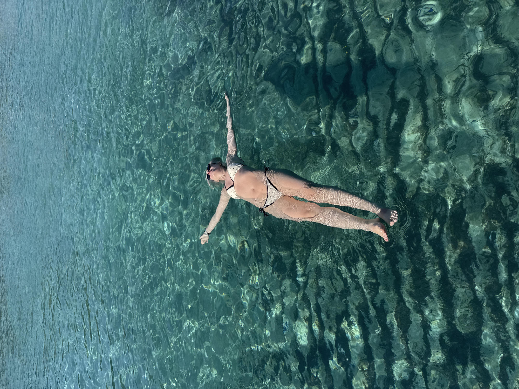 Swimmer enjoys calm waters off Cyprus coast