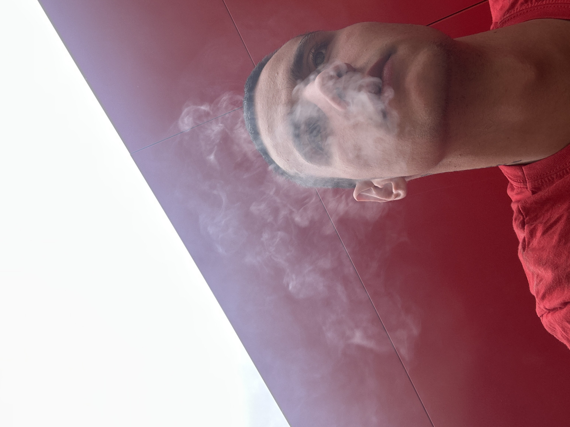 Man smoking photographed in Sofia with artistic background