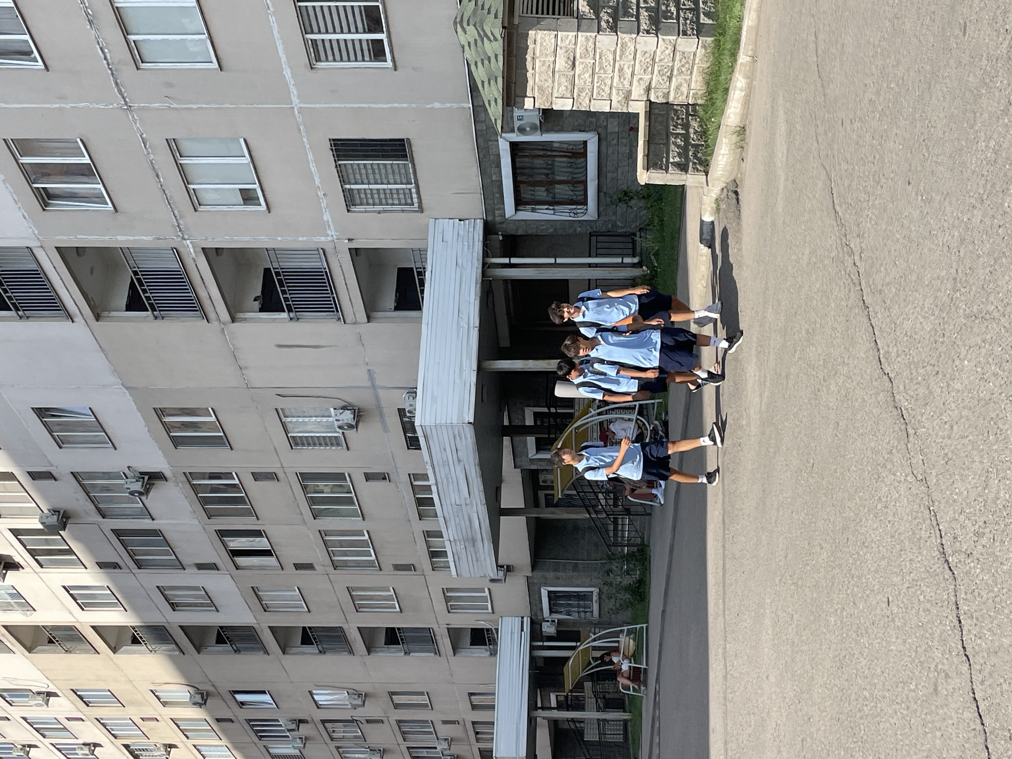 Quiet morning activity around a residential complex in Almaty