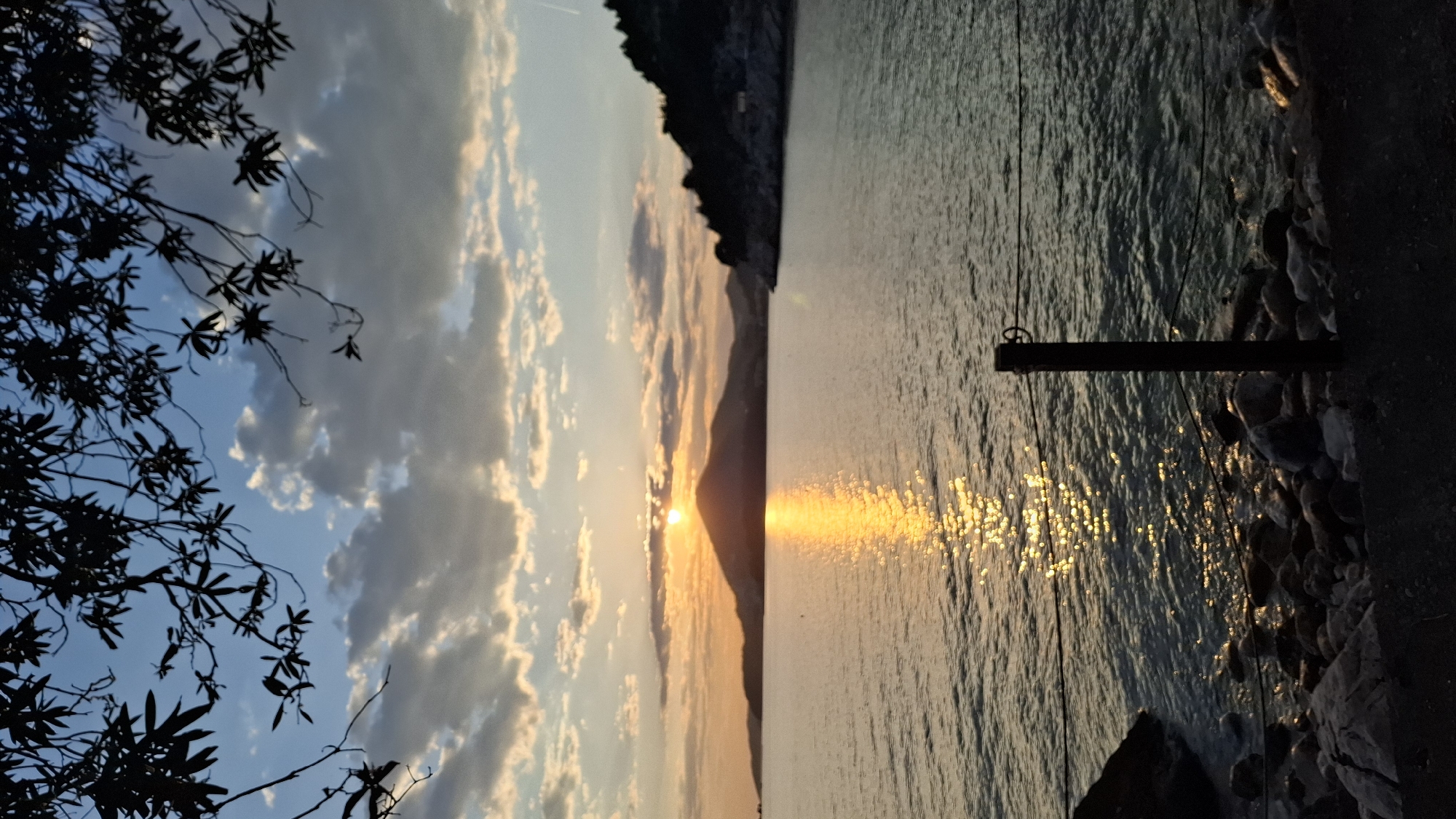 Evening stroll documented along Montenegro coastline during golden hour