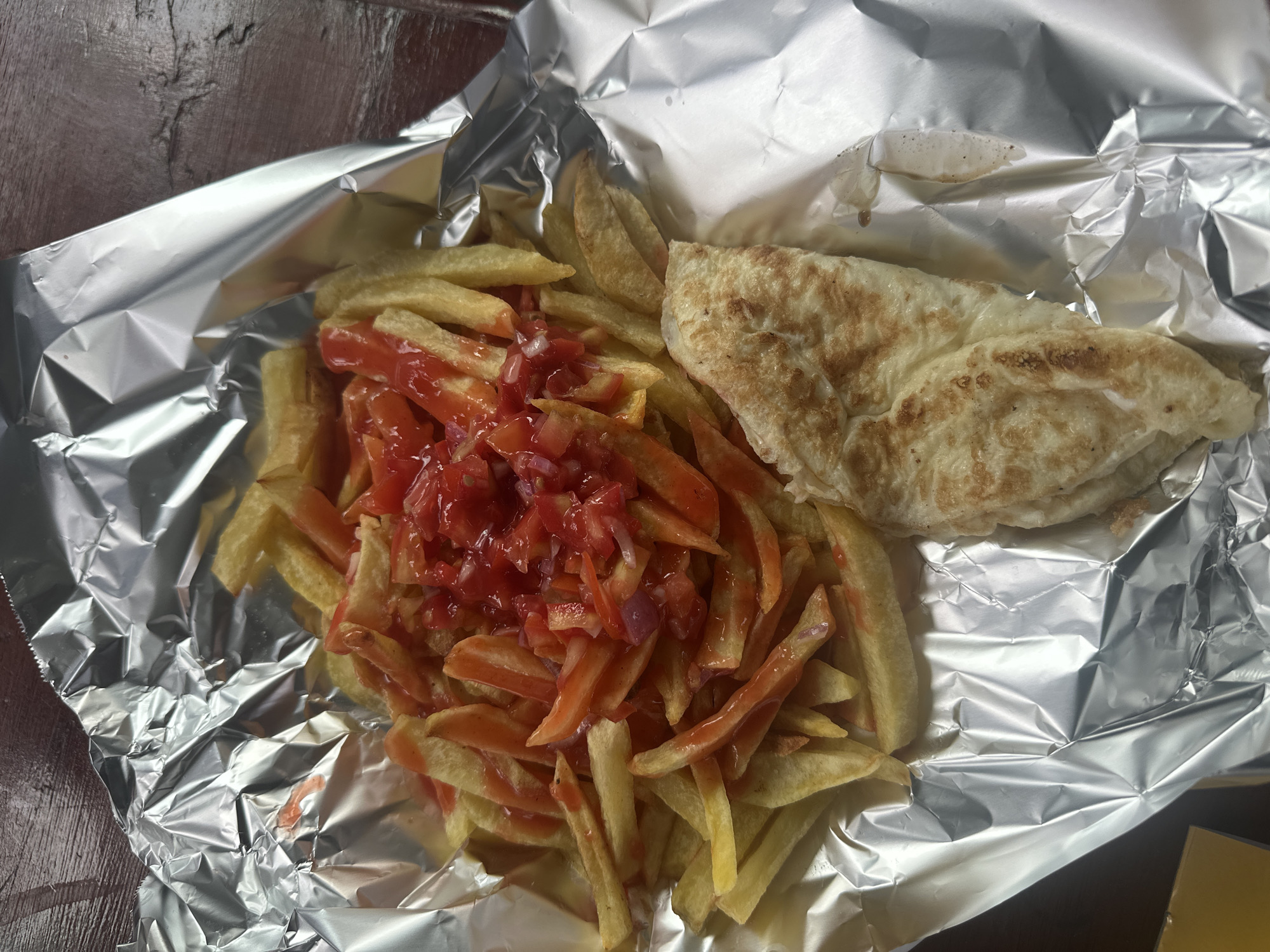 Lunch, a JBL speaker, and football at a Dar es Salaam canteen