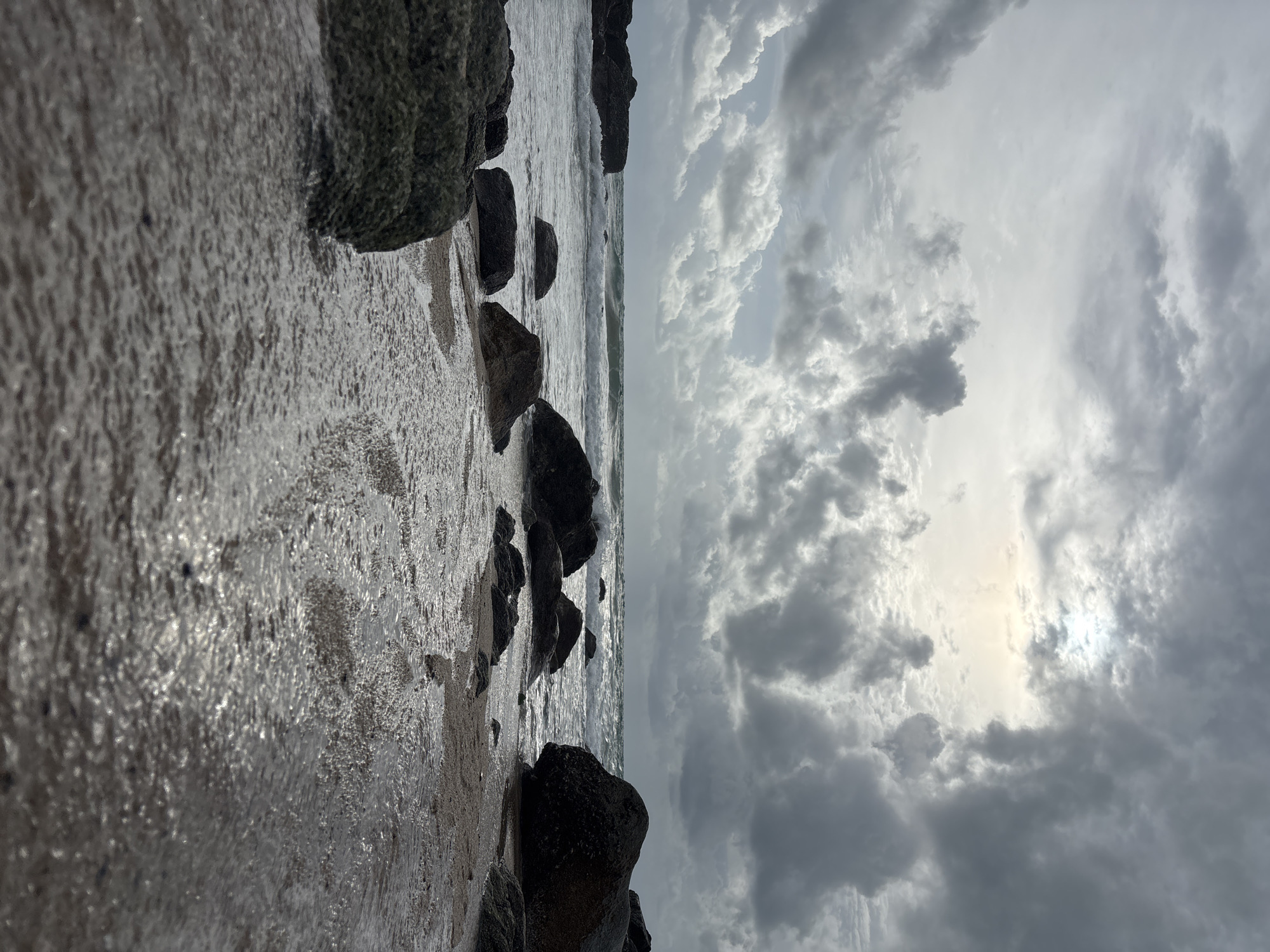 Overcast beach day draws visitors to Choeng Thale, Thailand