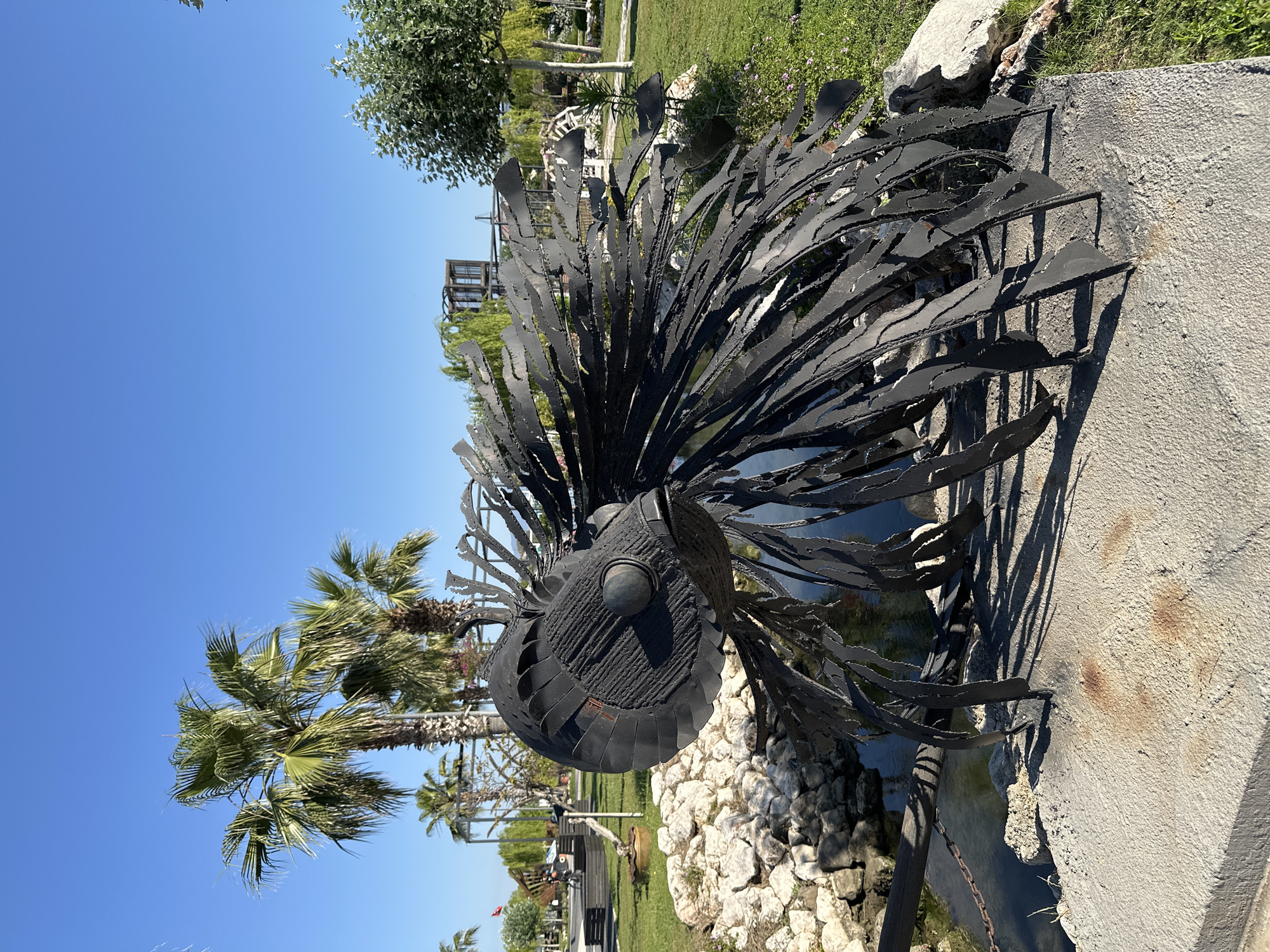 Woman captures morning stroll with stroller in Fethiye park