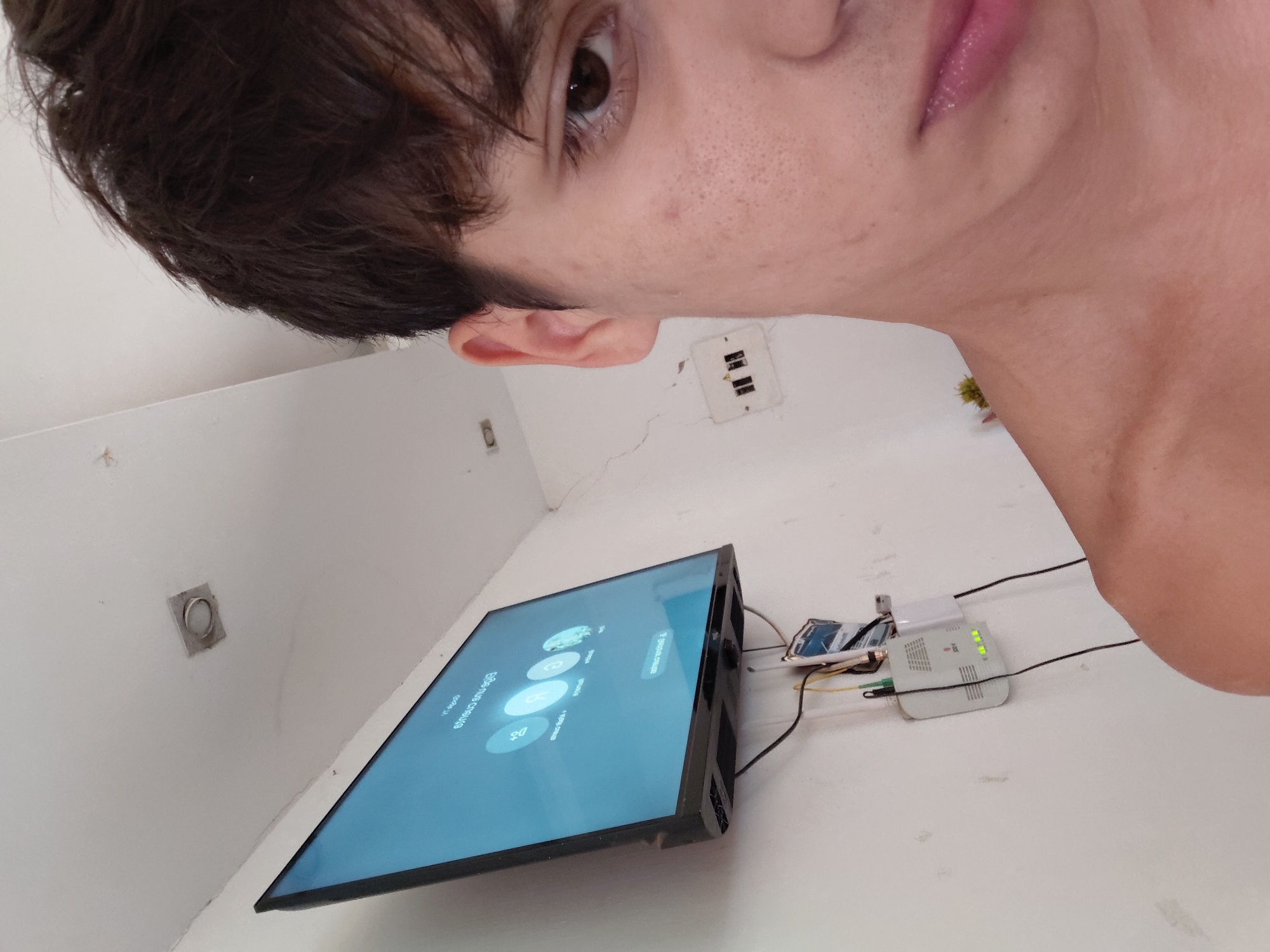 Indoor selfie session with earbuds on the floor nearby