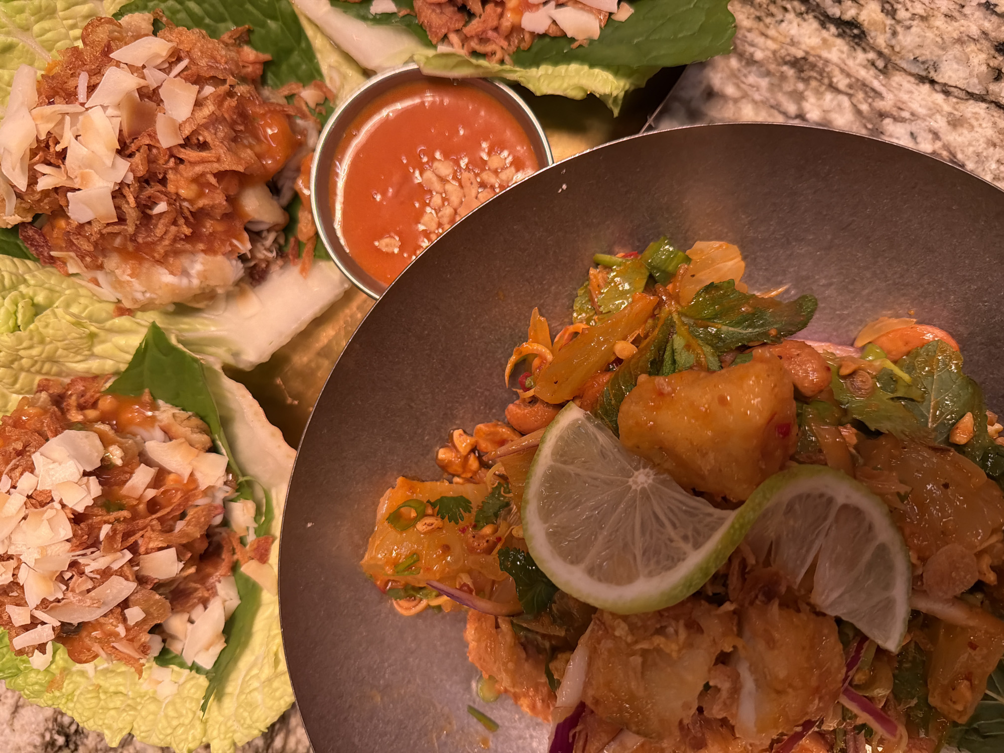 Asian appetizers and lettuce wraps served in Tel Aviv