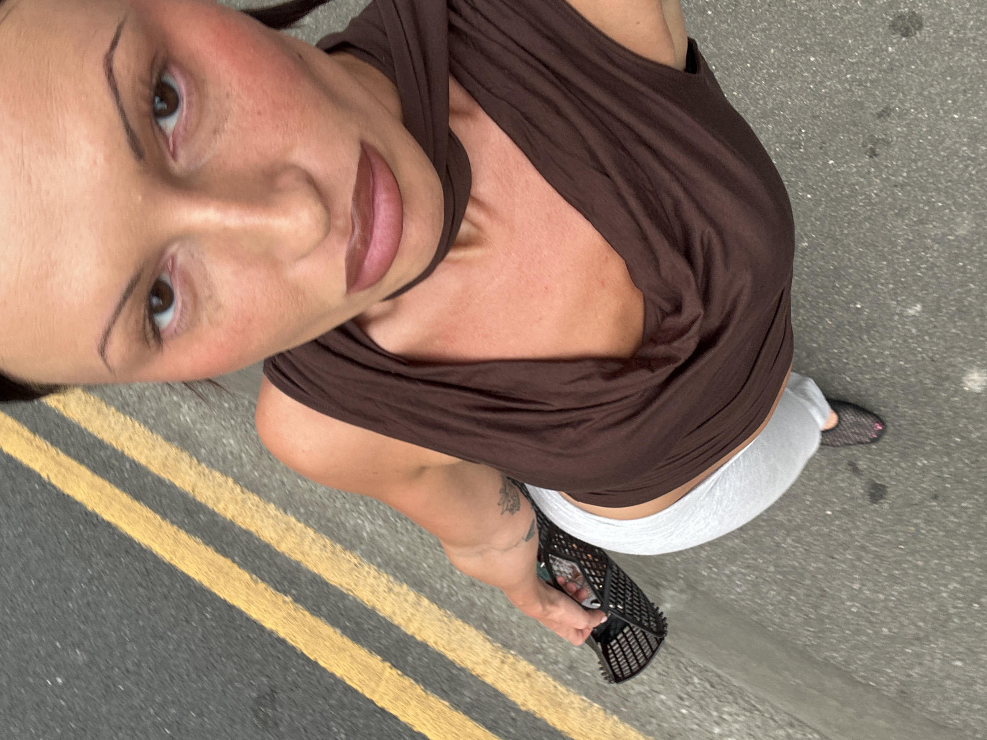 Woman with basket stands on double yellow lines in Tunbridge Wells