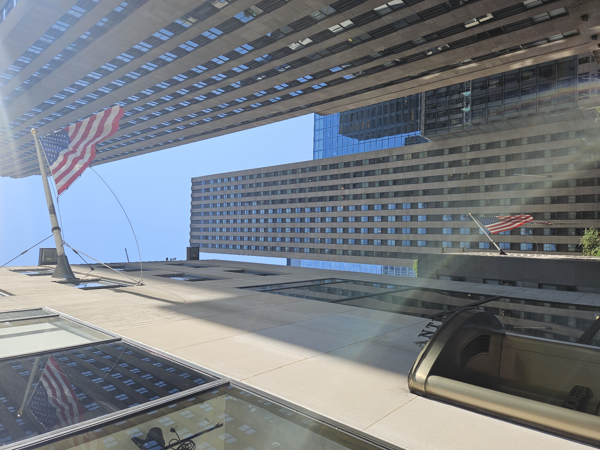 Midtown Manhattan: skyscrapers, a robot display, and World Cup promo pins