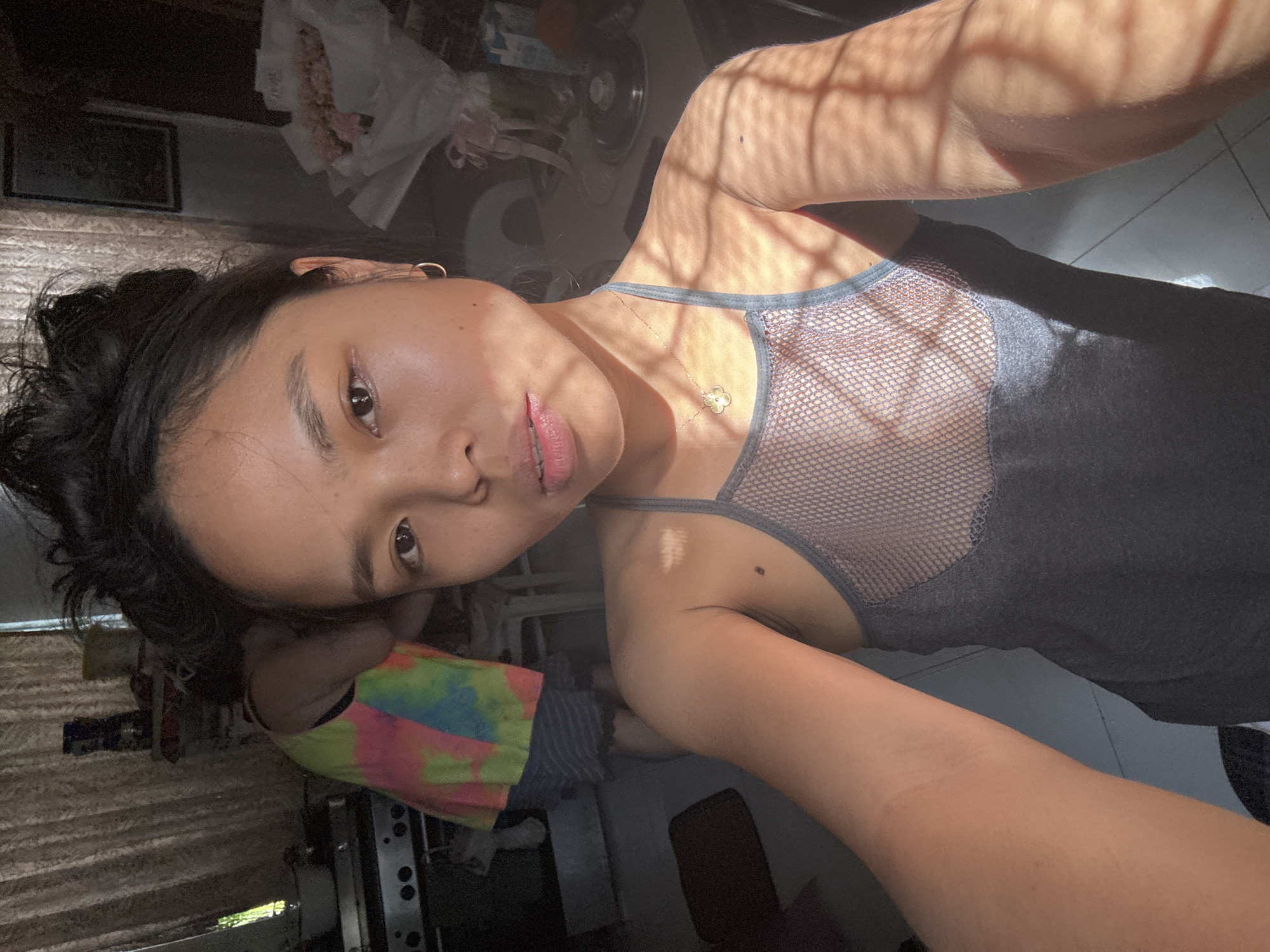 Quiet domestic morning in Davao: cats, laundry, flowers, and selfies