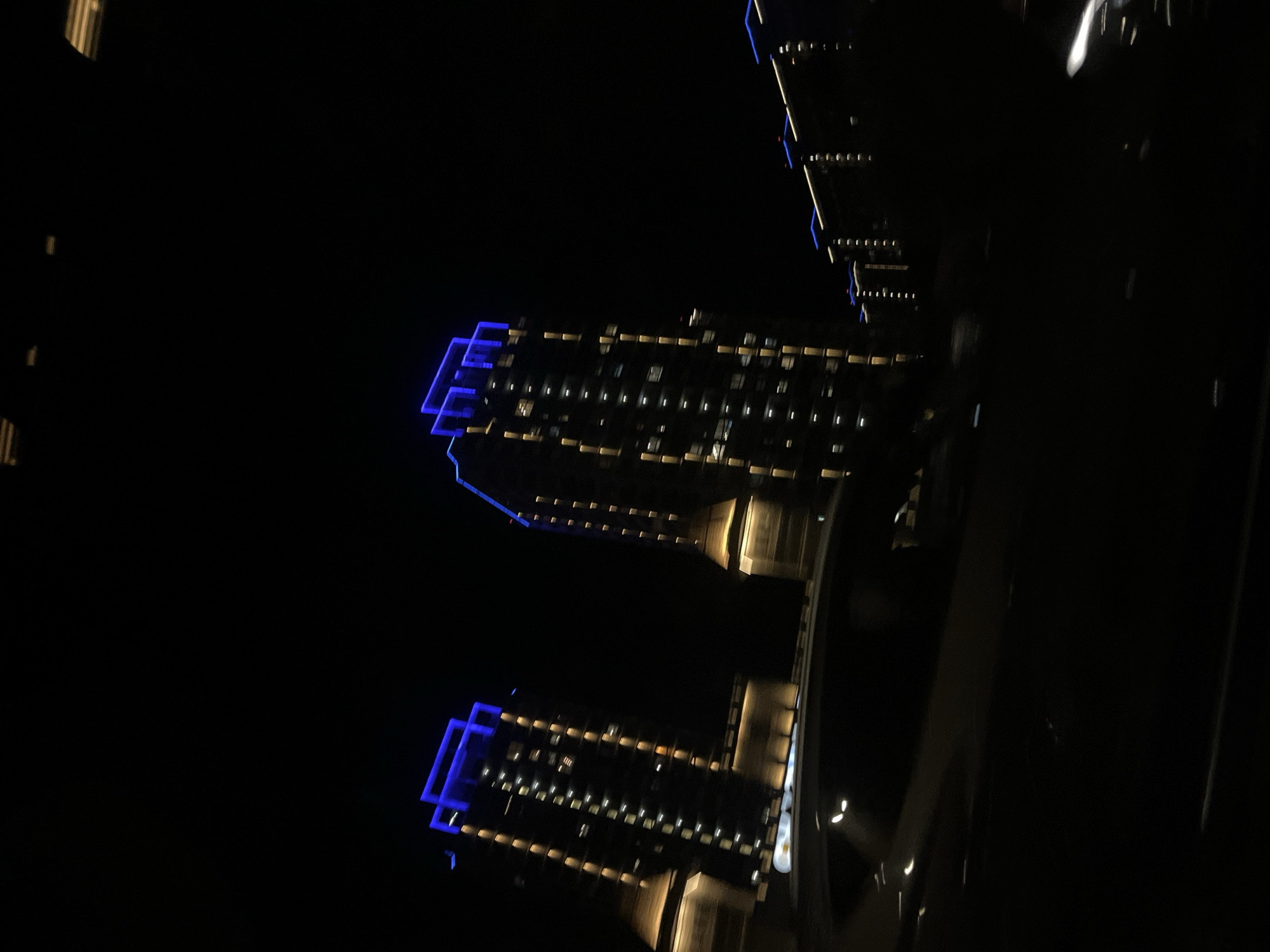 Nighttime view of illuminated buildings captured in Krasnodar