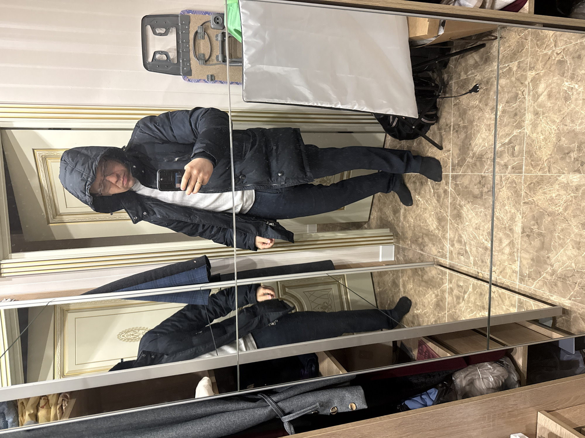Khimki resident photographs self, arranges board games at home