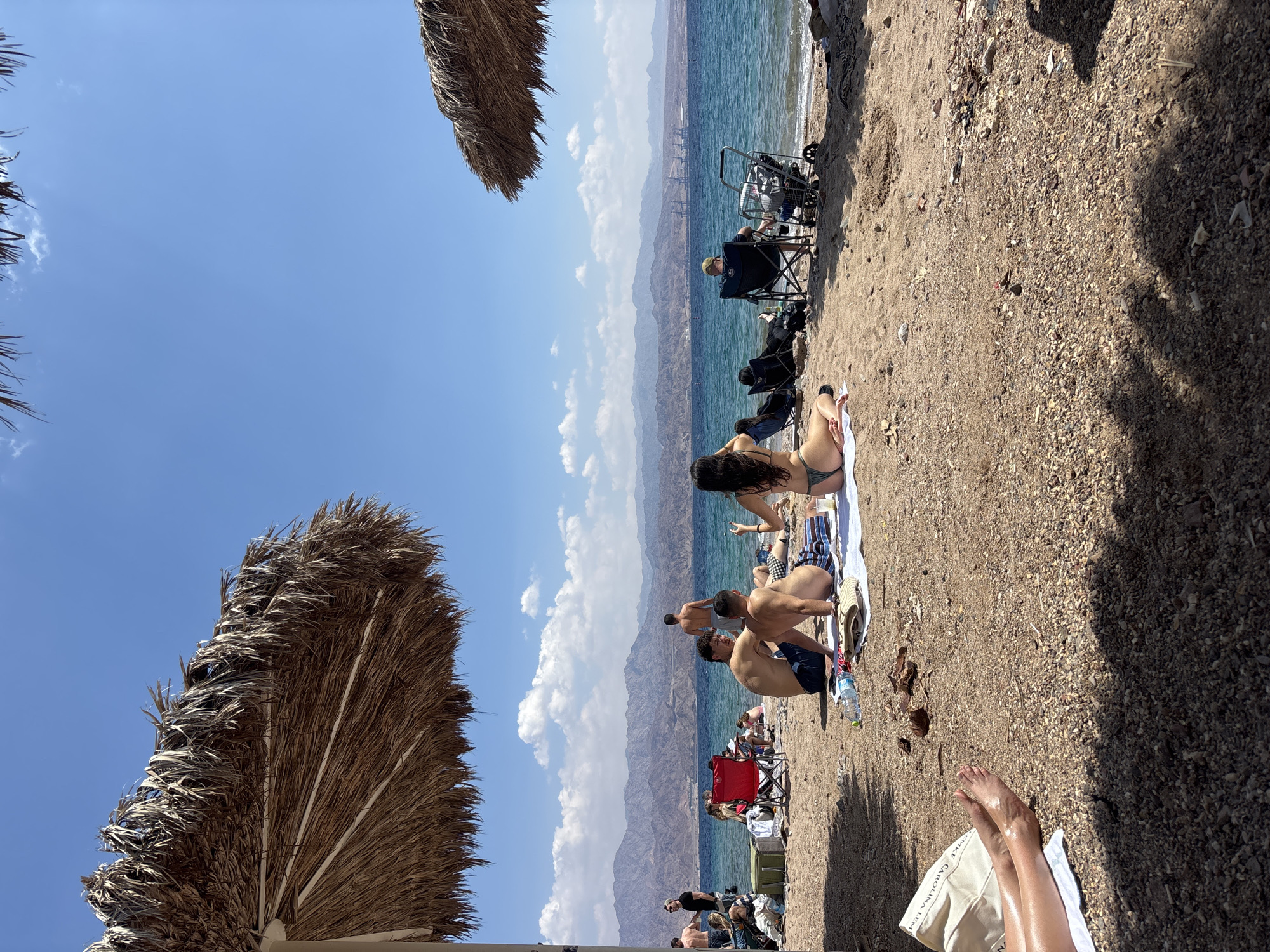 Woman enjoys morning beach time in Eilat, Israel
