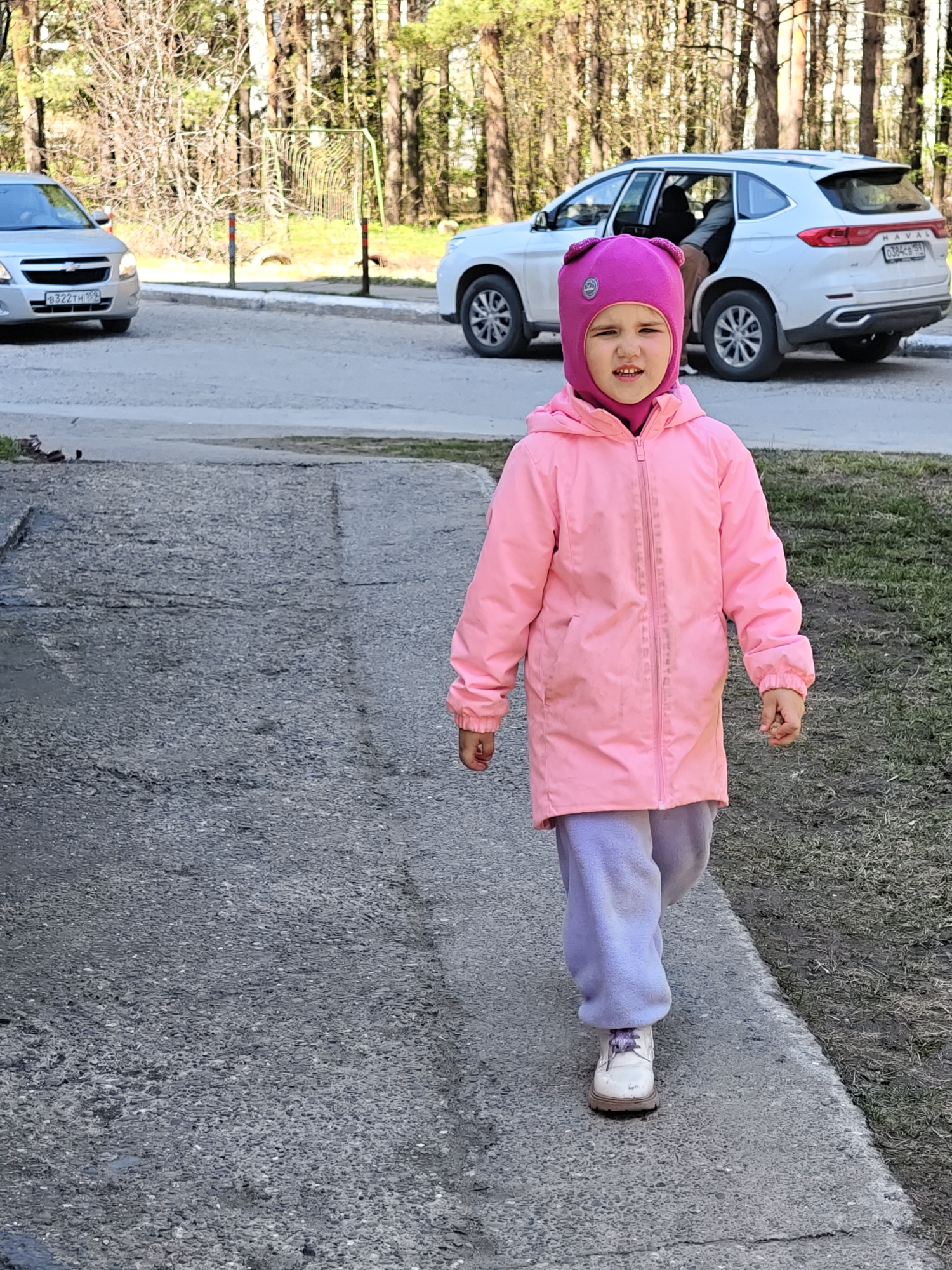 Family playground activities documented across Chaikovsky, Russia morning hours