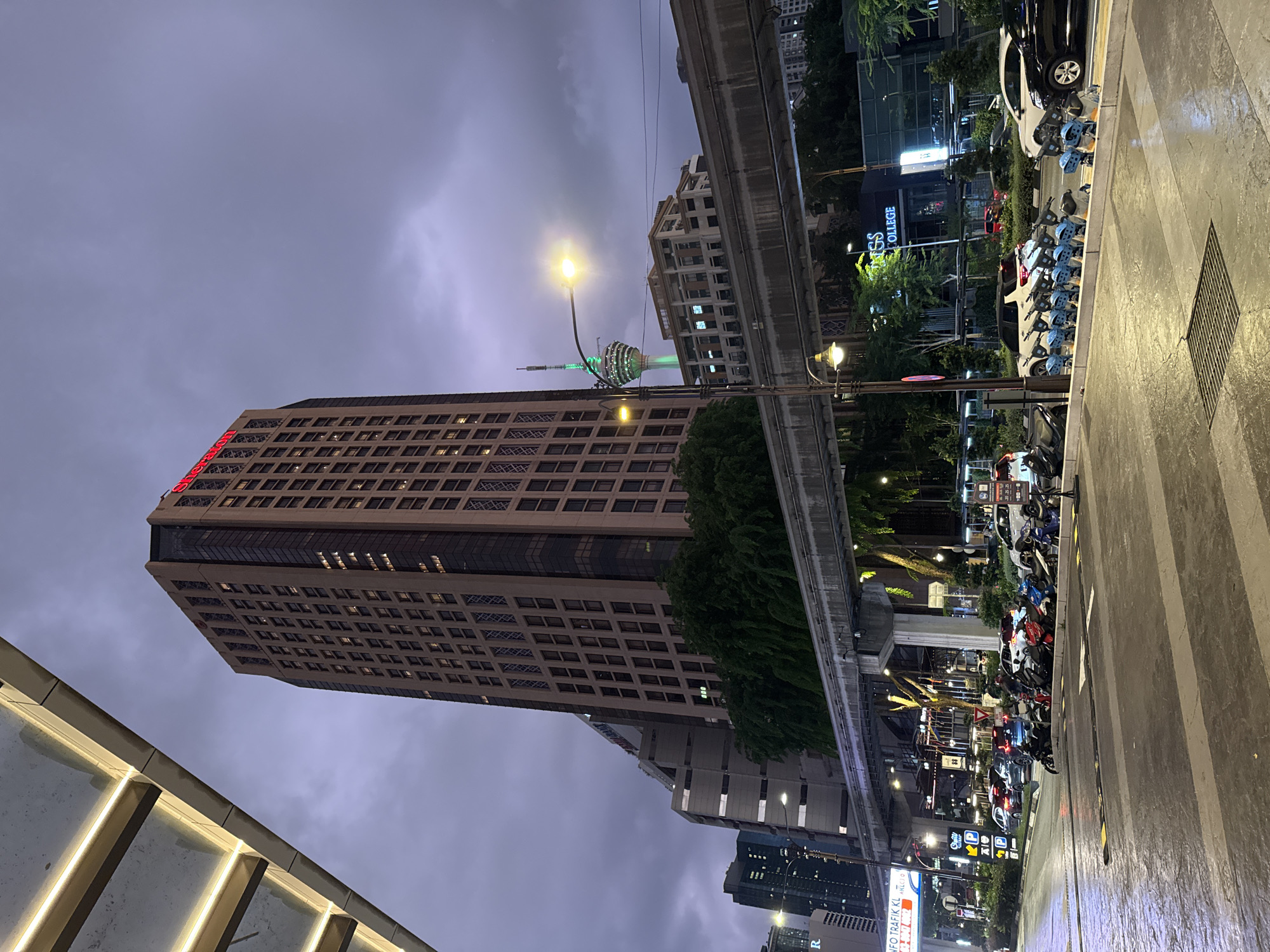 Street-level and skyline views across central Kuala Lumpur