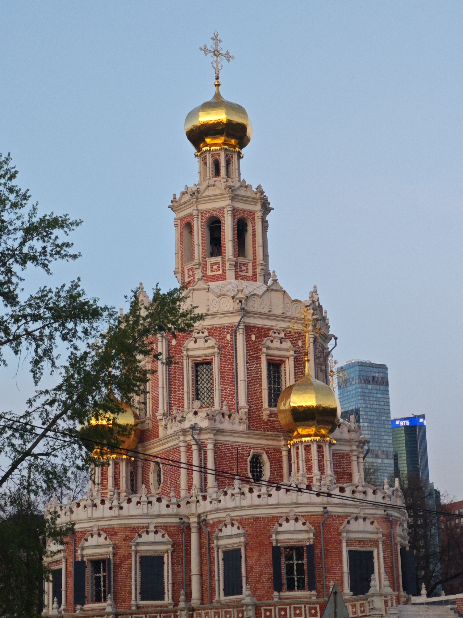 Moscow's historic Orthodox architecture juxtaposed with modern skyline development
