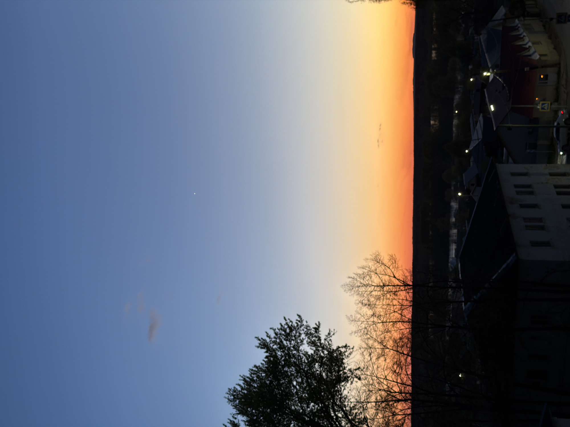 Evening life documented across Chaikovsky, Russia in spring twilight