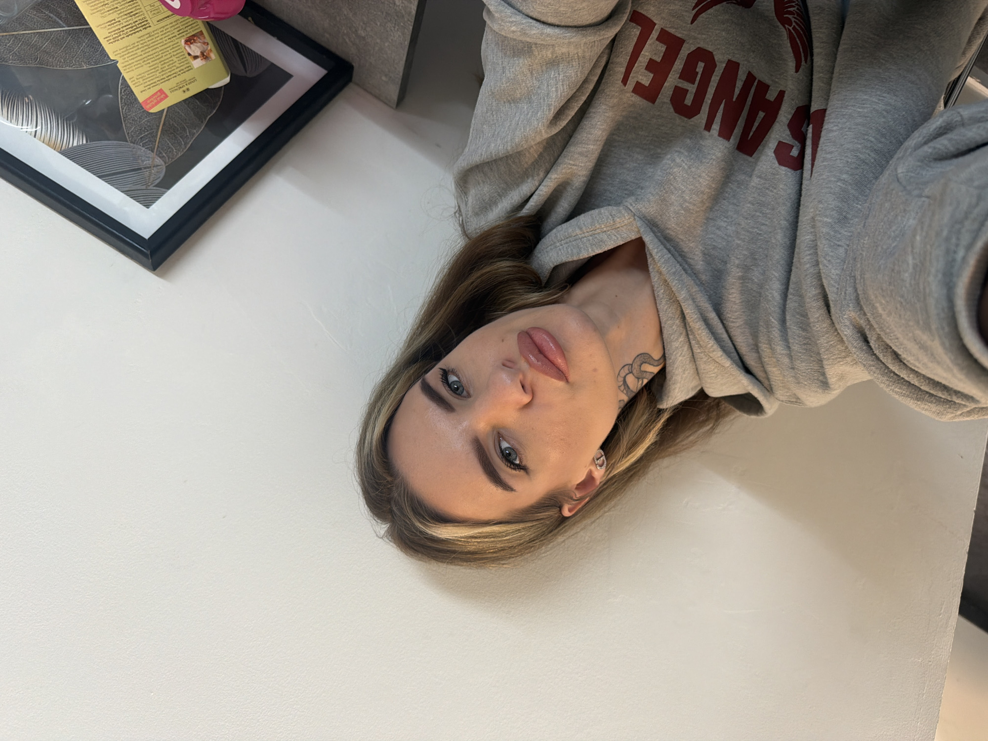 Woman Takes Indoor Selfie Portrait in Berlin