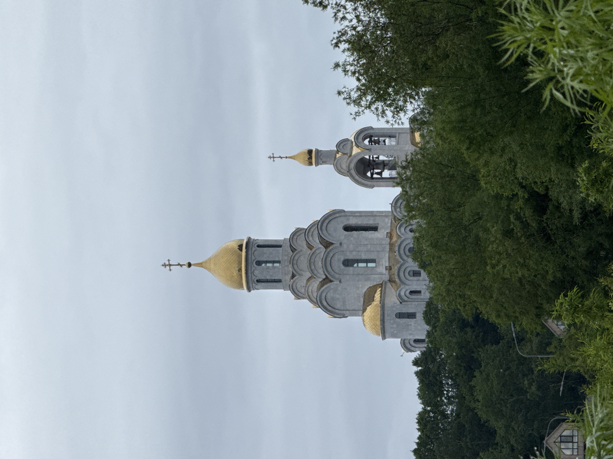 Orthodox church with golden domes on a hill in Kamchatka