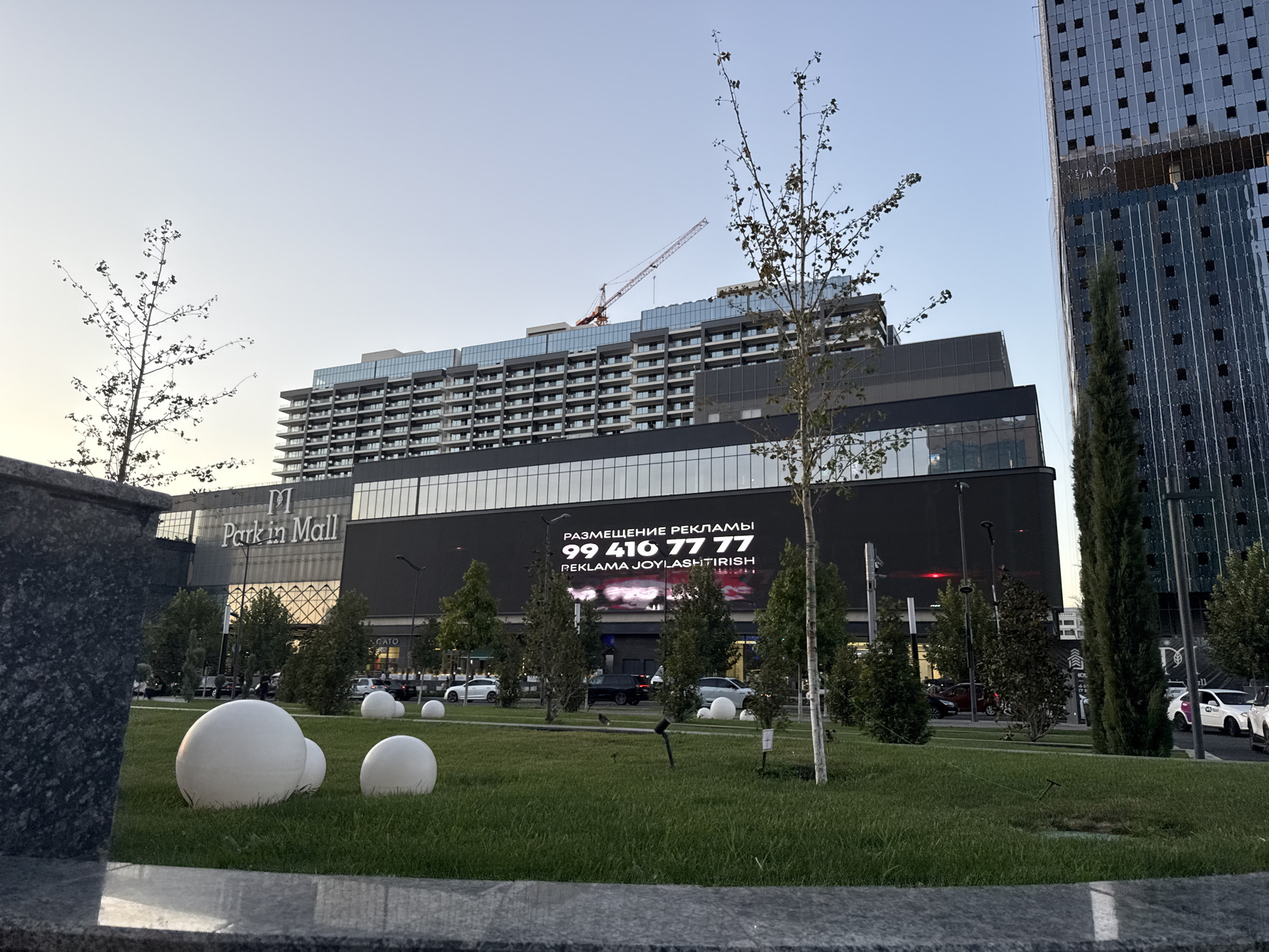 Tashkent's modern skyline and street scenes on a late summer afternoon