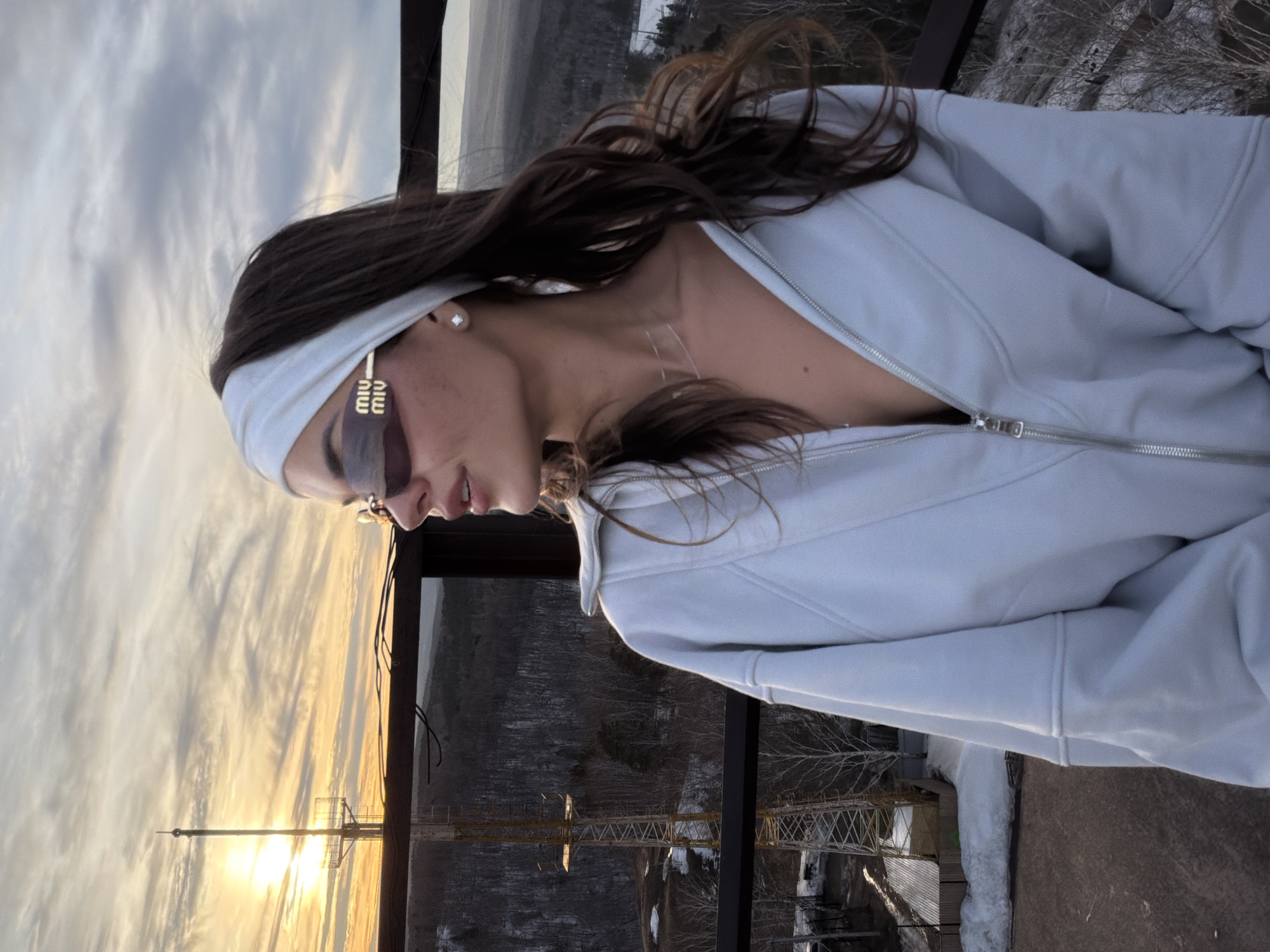 Woman poses on observation deck in Krasnoyarsk