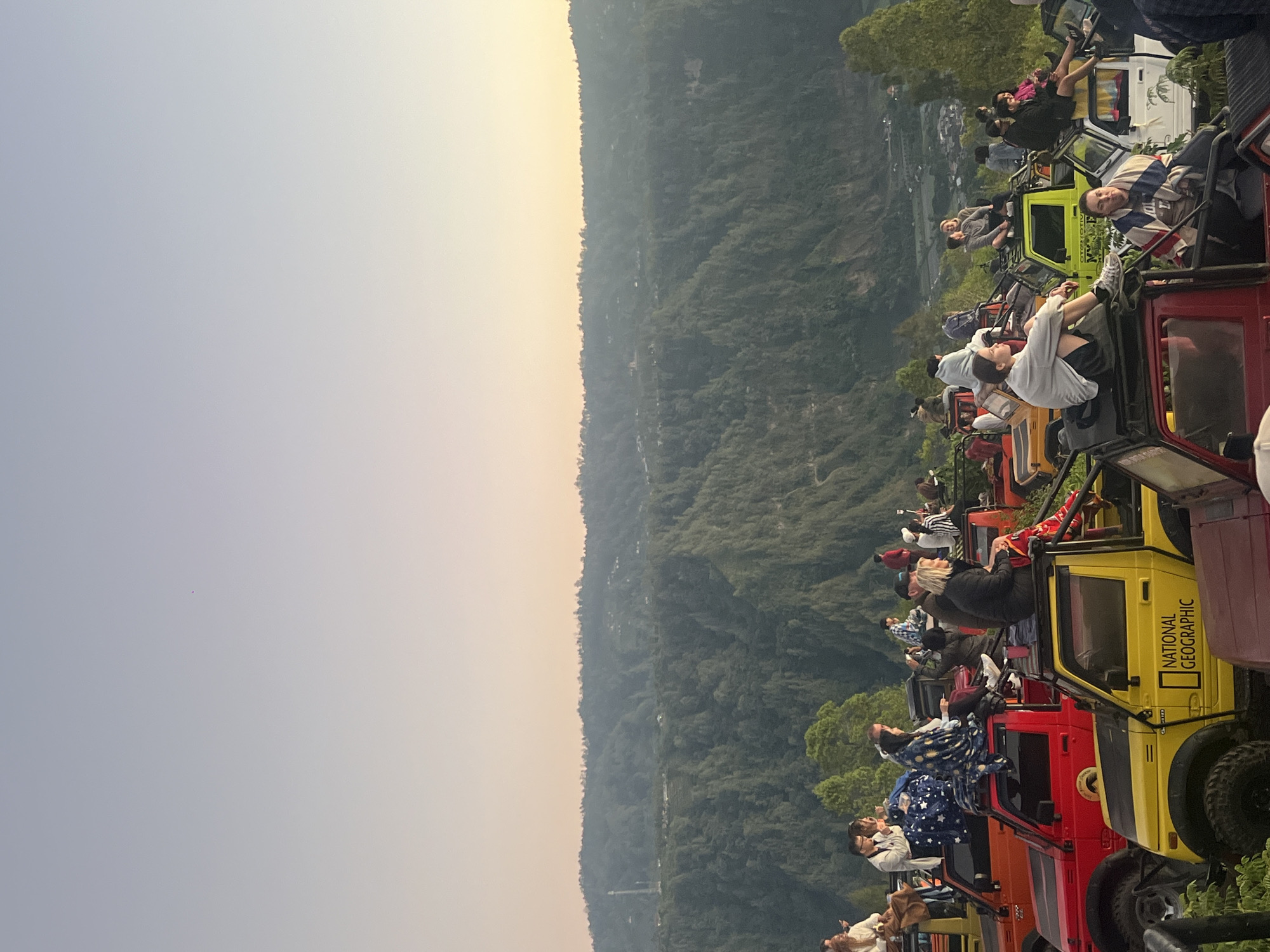 Sunset from jeep rooftops over Kintamani's volcanic valley