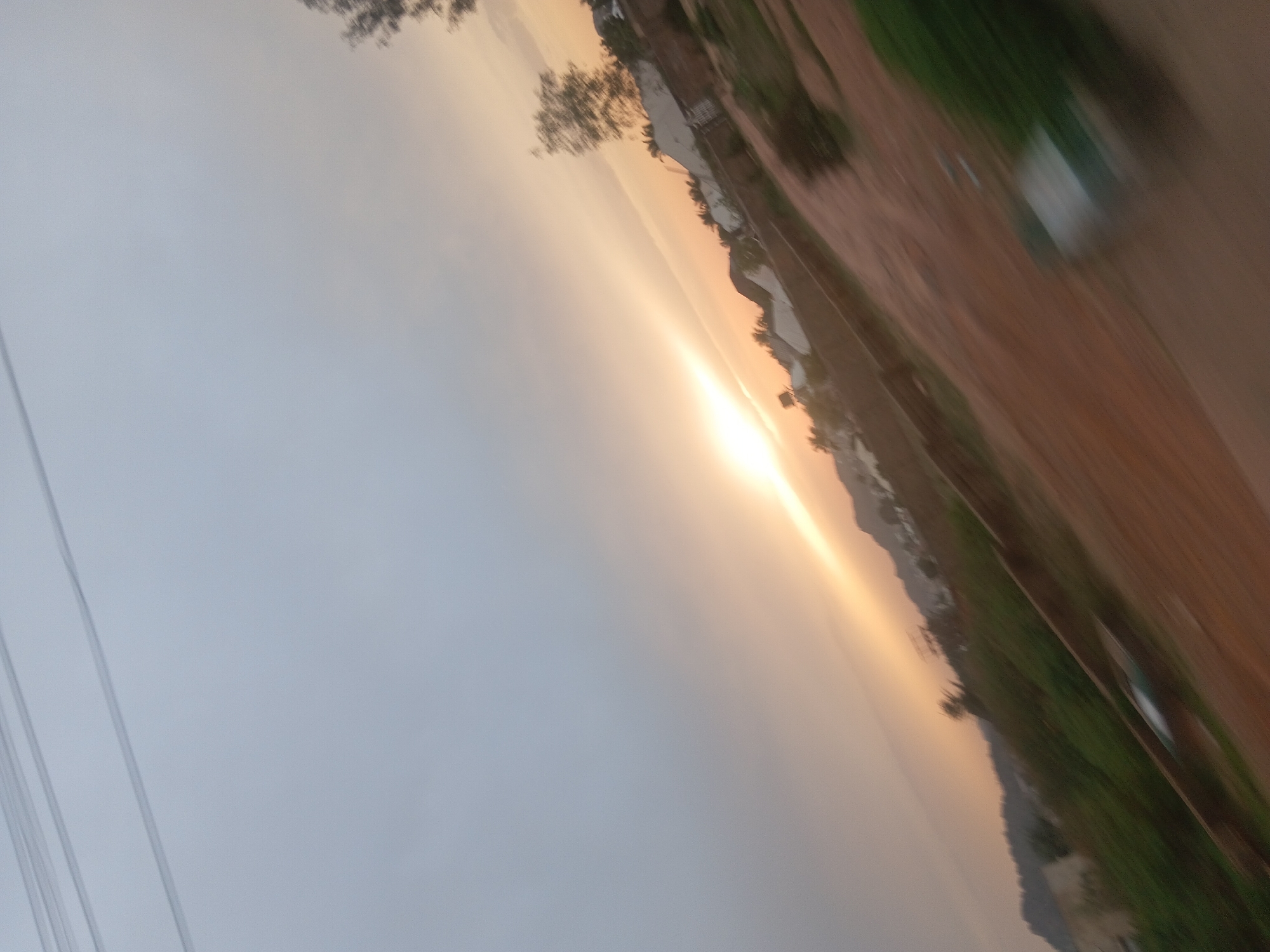 Sunset observed over vegetation landscape in Bukuru, Nigeria