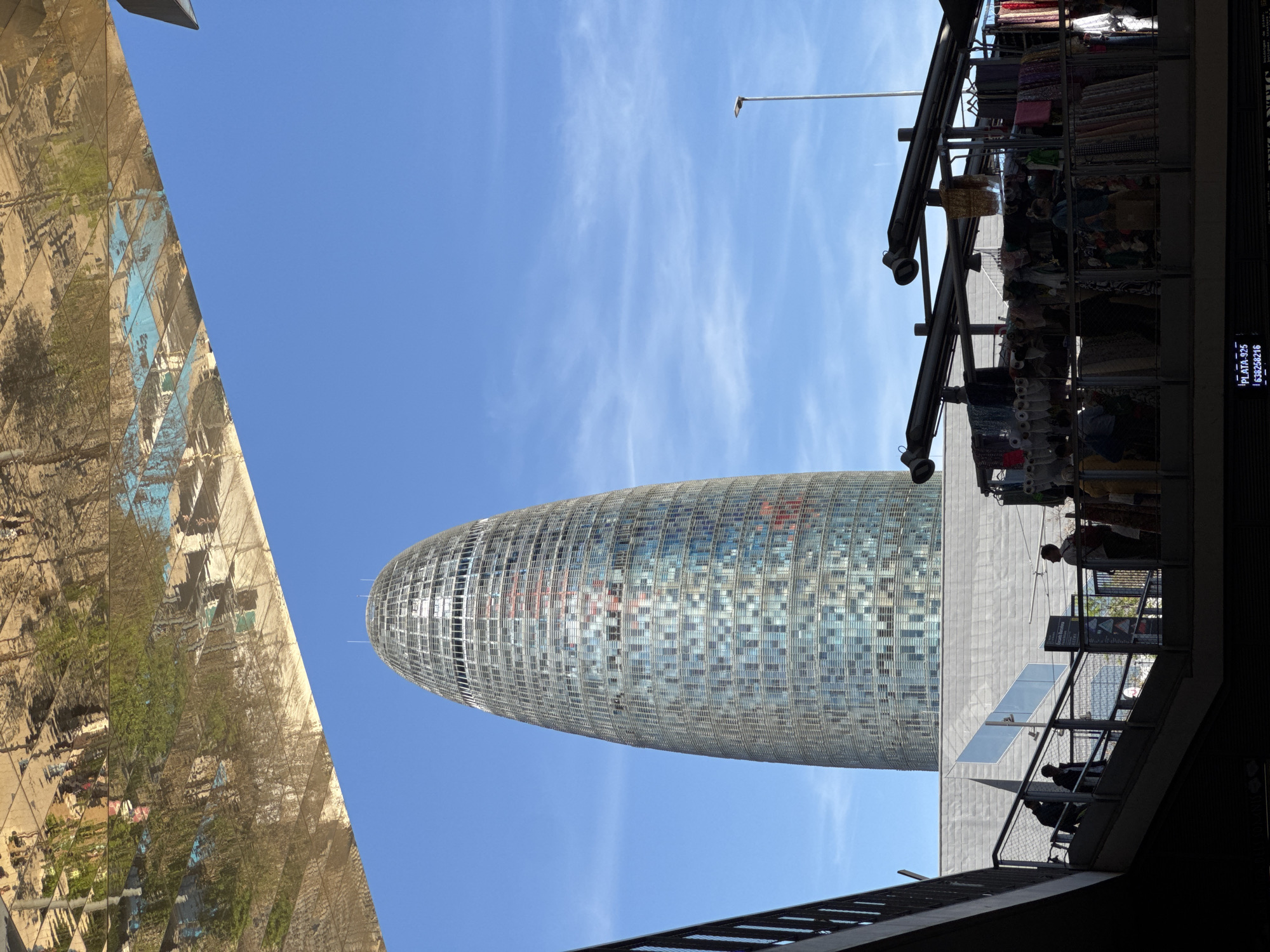 Witness documents busy Barcelona flea market and Torre Glòries